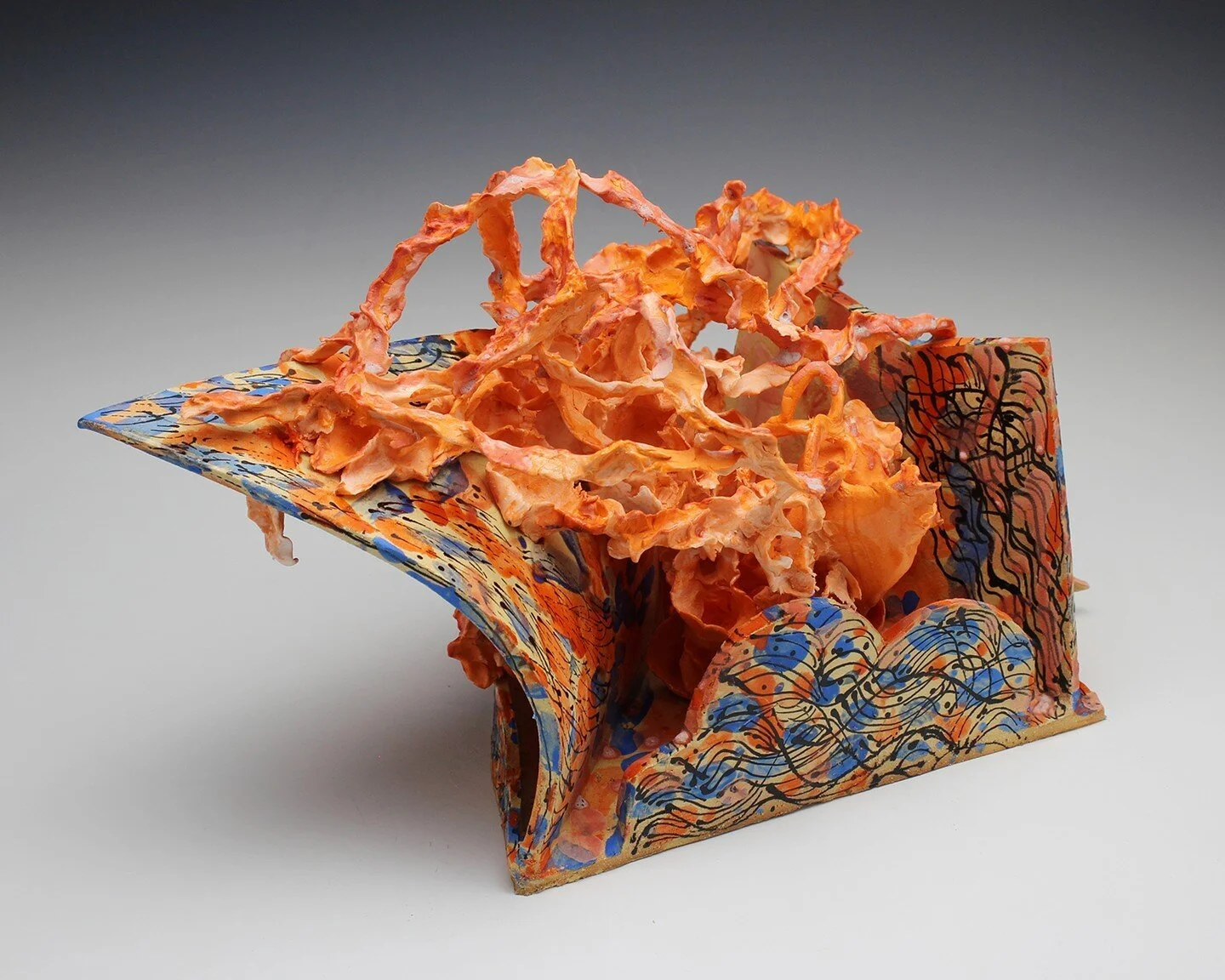 Liget| Colored porcelain and stoneware with glaze | 16" x 10" x 10"|2022 It&rsquo;s the fire in the chili and the rush in the rapids. Light is the name given to an angry energy that fuels not just human bodies but inanimate ones too.&m