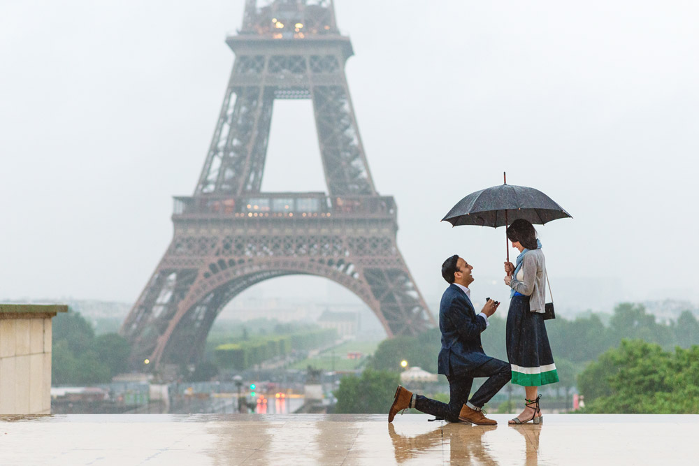 Paris-photographer-Paris-for-Two-Christian-Perona-professional-engagement-proposal-pre-wedding-portrait-Eiffel-tower-sunrise-Trocadero-rain-rainy-day-umbrella-wedding-ring-she-said-yes-he-asked.jpg