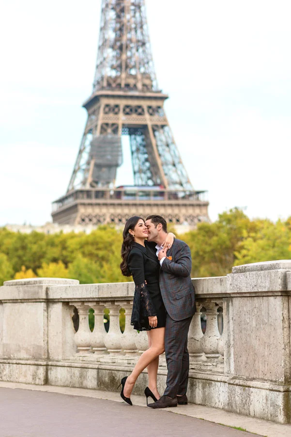 Paris-for-Two-Christian-Perona-engamement-proposal-she-said-yes-photoshoot-romantic-trip-Bir-Hakeim-bridge-Eiffel-tower-kissing-suit.jpg
