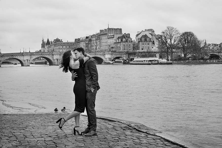 Paris photographer proposal engagement Seine riverside bridge she said yes