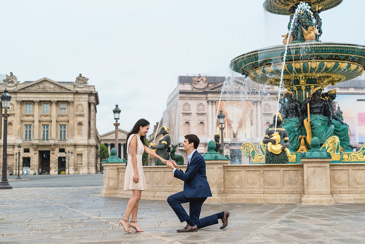 Paris photographer proposal engagement Place de la Concorde wedding ring she said yes