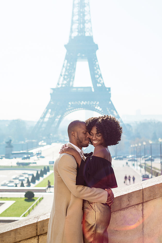 Paris photographer surprise proposal engagement pre wedding Eiffel tower Trocadero black power couple