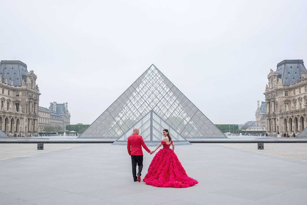 Paris-for-two-photographer-proposal-engagement-Louvre-pyramid-sunrise-red-dress.jpg