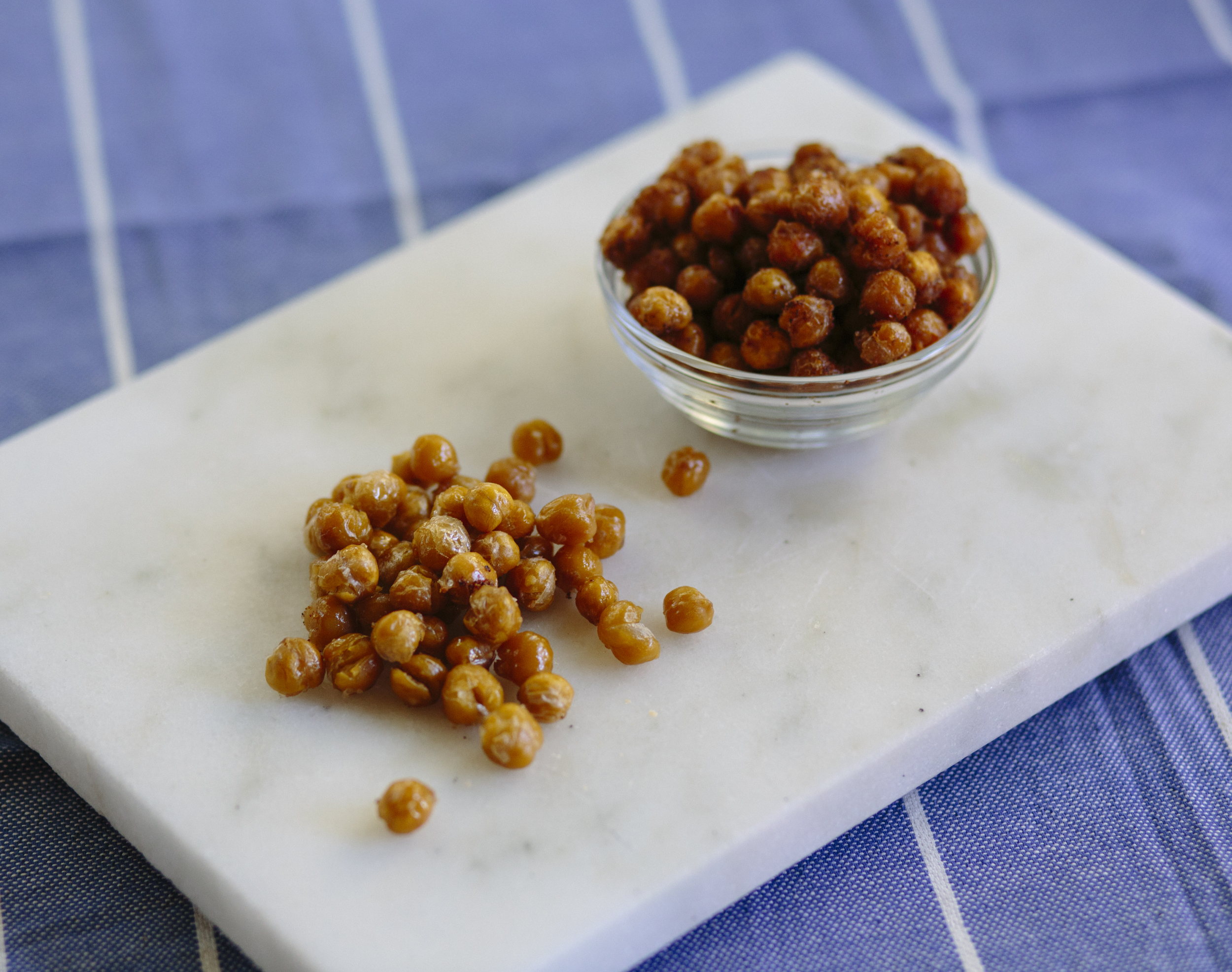 Salt and vinegar roasted chickpeas on the left; spicy roasted chickpeas on the right.
