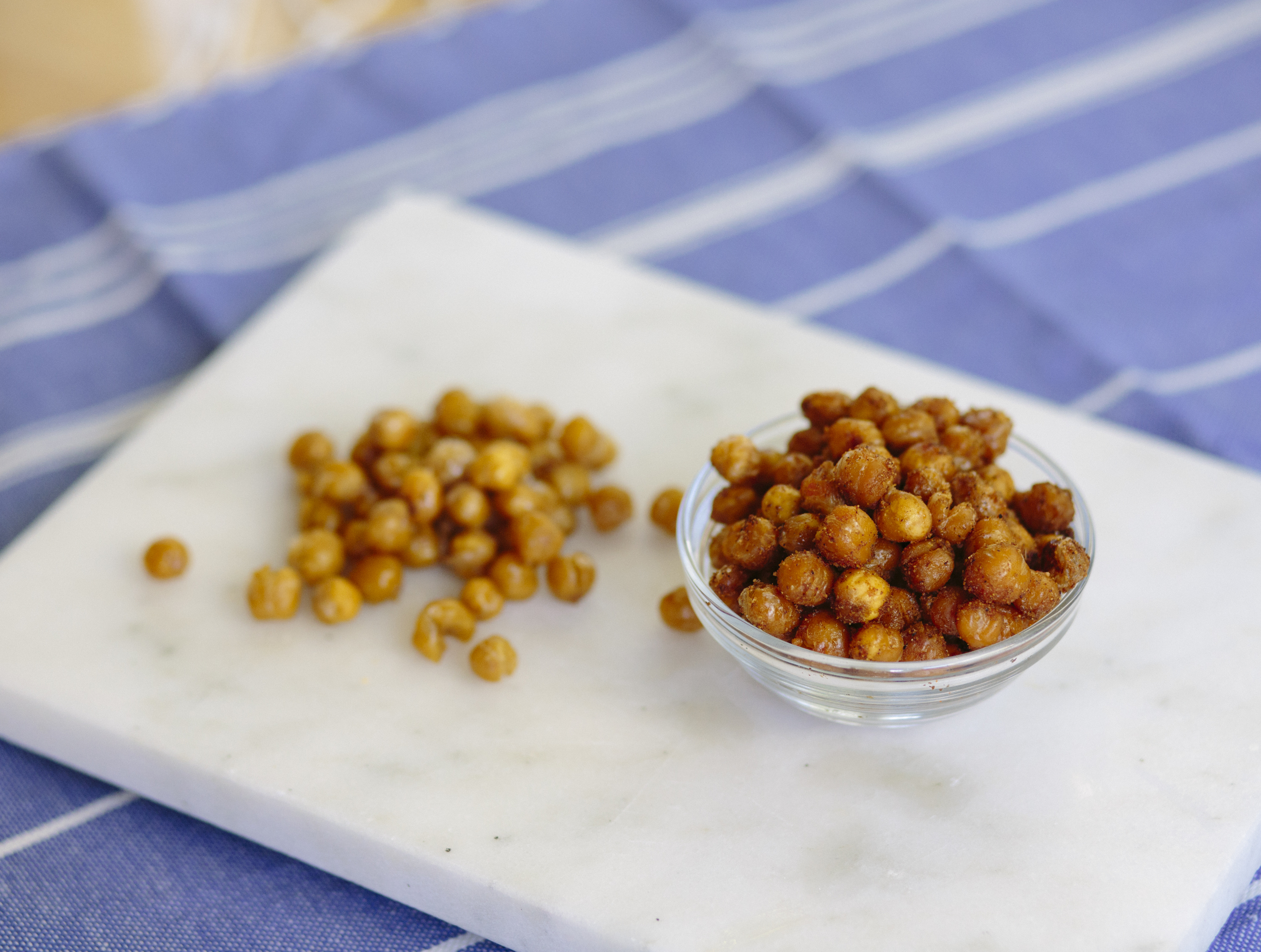 Spicy roasted chickpeas on the right; salt and vinegar roasted chickpeas on the left.