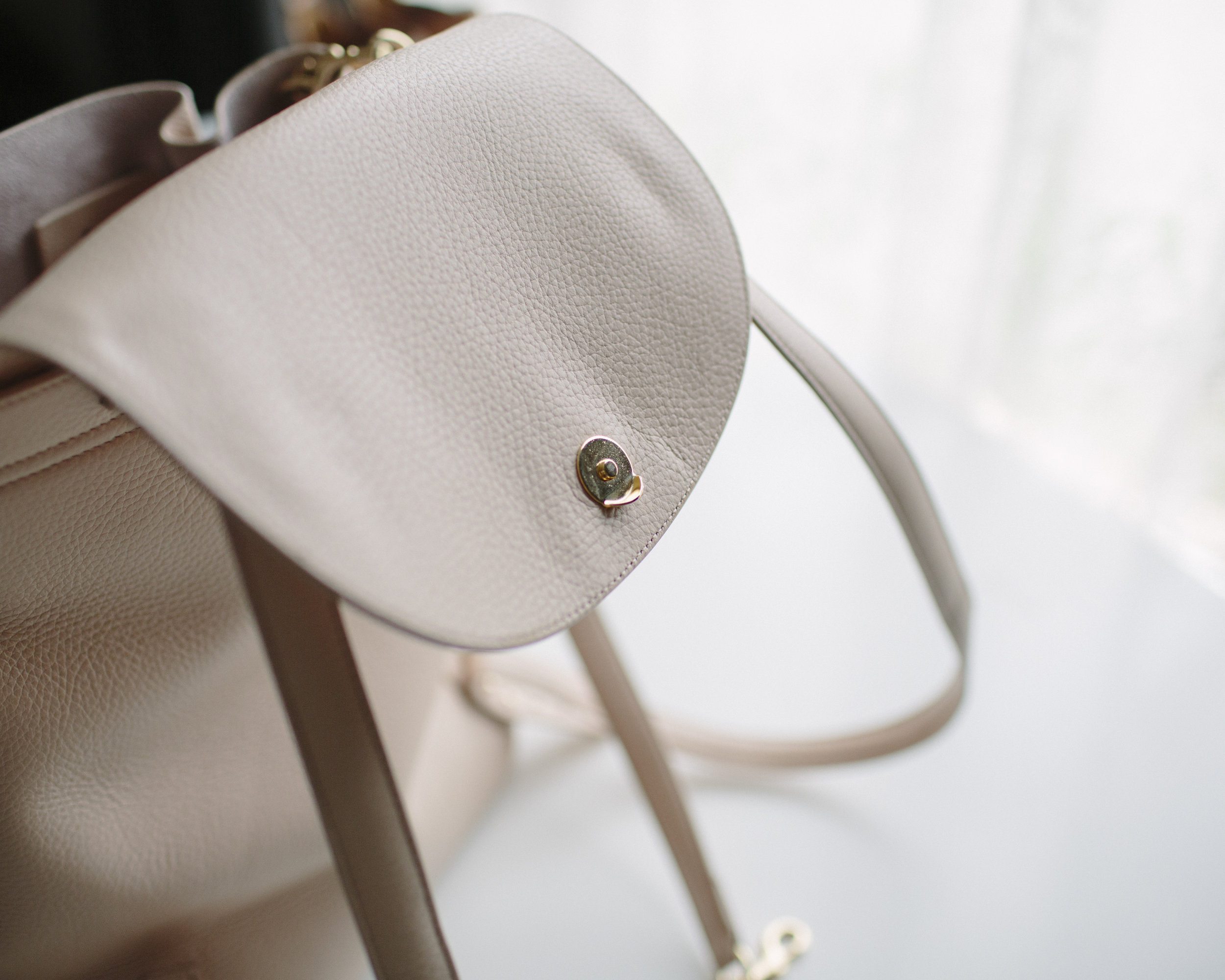 The lip on the closing clasp helps the bag stay closed better.