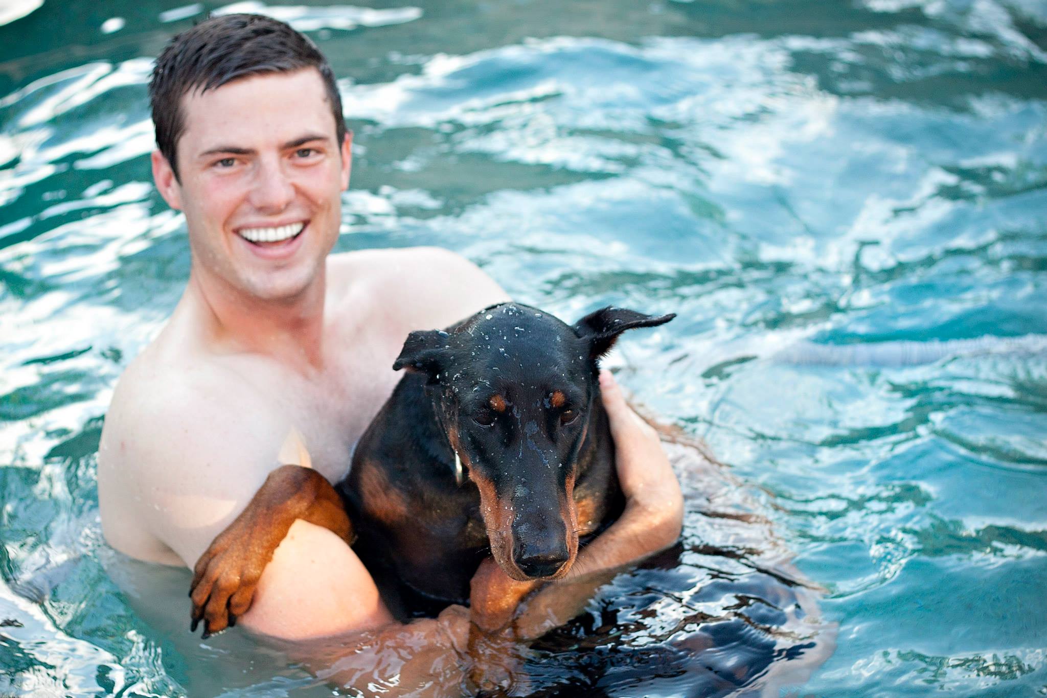 danny swimming with nike.jpg
