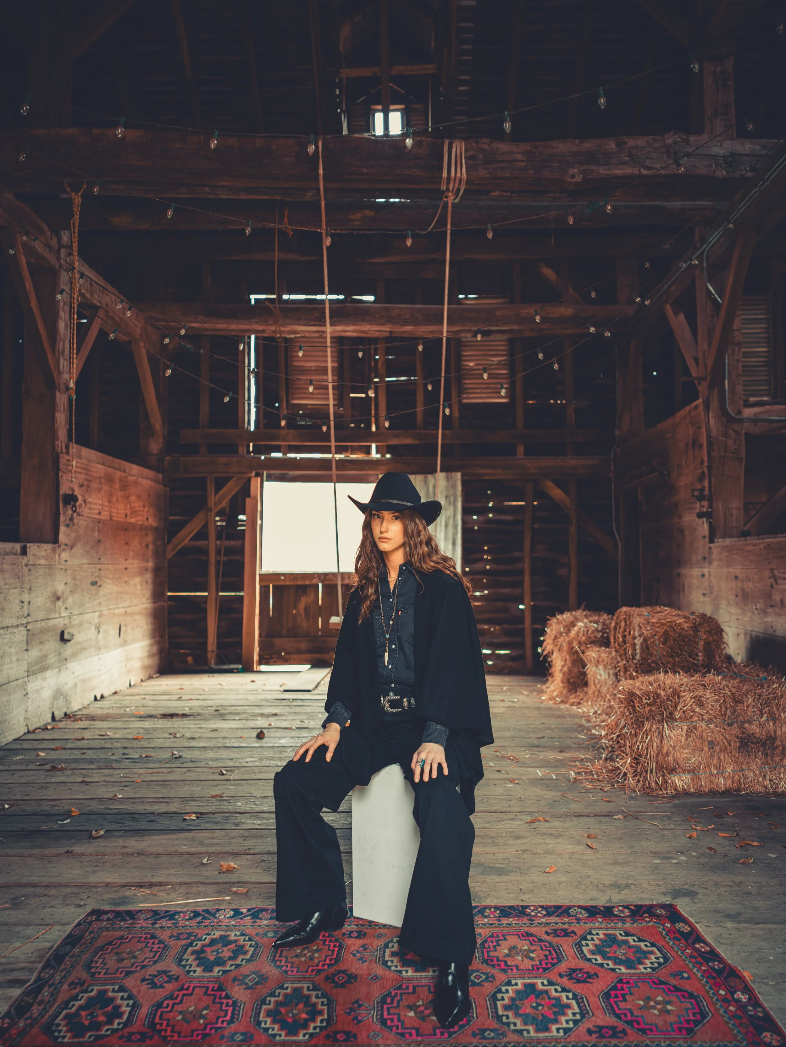 Cowgirl portrait in the autumn landscape