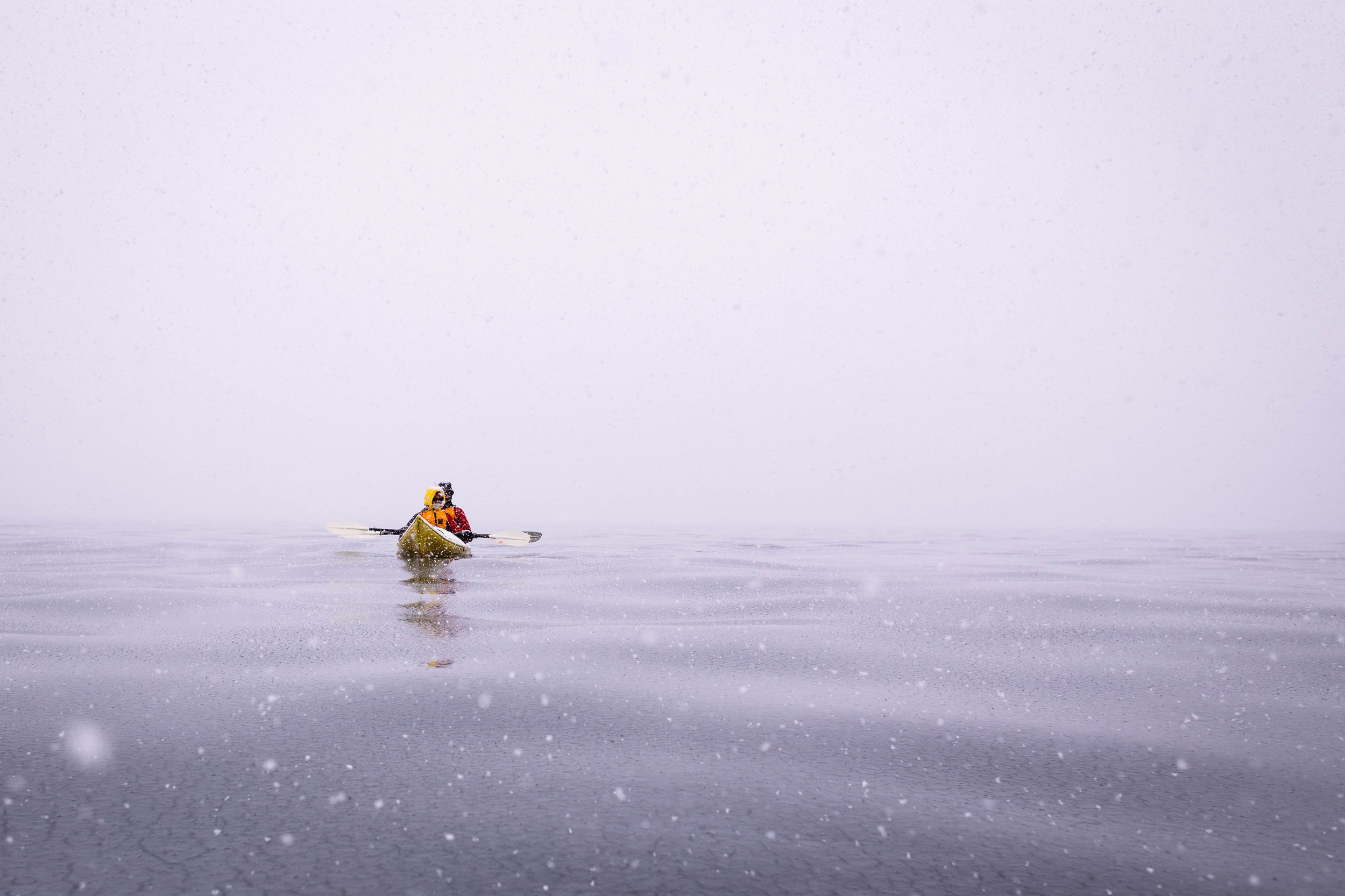 Nick and Marie waiting for the rest of the group to launch into their kayaks. This photo was taken at Salvesen Cove, our first time out on the water. The morning started with mysterious, quiet snowfall and freshly forming sea ice all around us. Within an hour, the sun revealed an incredible glacier cove. The weather changes fast in Antarctica, and my was it magical.