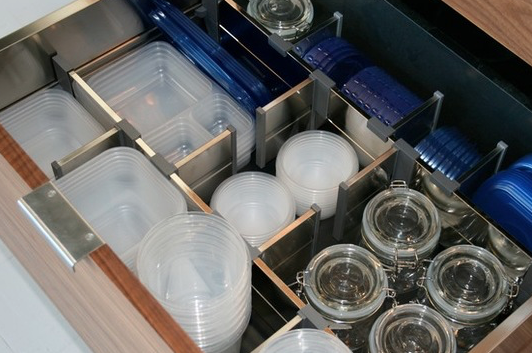 Tupperware drawers often become the second messiest place in the kitchen (after the utensil drawer) but this well-suited stacking storage drawer could save days of your life that might be wasted searching for that missing lid.