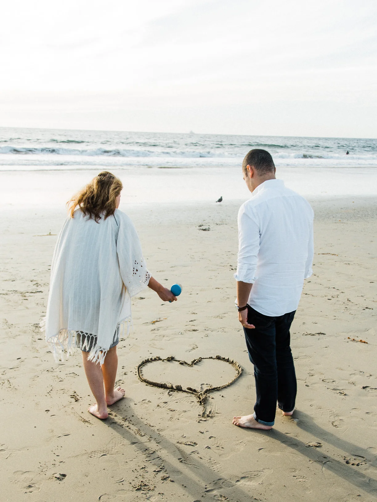 Juli and Tim Maternity Portrait Session at The Manhattan Beach Pier in Manhattan Beach, CA from Daniel Doty Photography. Maternity Portrait Session at The Manhattan Beach Pier Photographs and Maternity Portrait Session at The Manhattan Beach Pier Photography from Fine Art Family Portrait and Wedding Photographer, engagement photographer and Wedding Photographer Daniel Doty Photography.