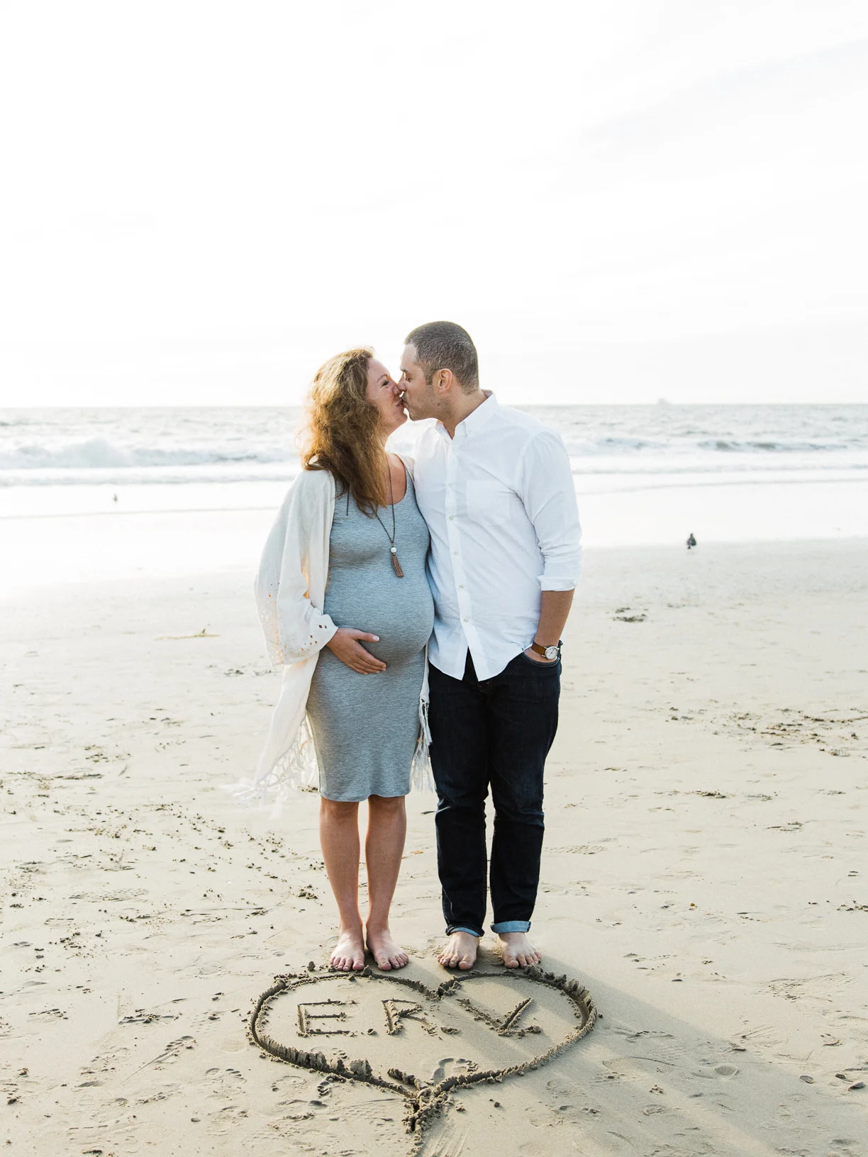 Juli and Tim Maternity Portrait Session at The Manhattan Beach Pier in Manhattan Beach, CA from Daniel Doty Photography. Maternity Portrait Session at The Manhattan Beach Pier Photographs and Maternity Portrait Session at The Manhattan Beach Pier Photography from Fine Art Family Portrait and Wedding Photographer, engagement photographer and Wedding Photographer Daniel Doty Photography.