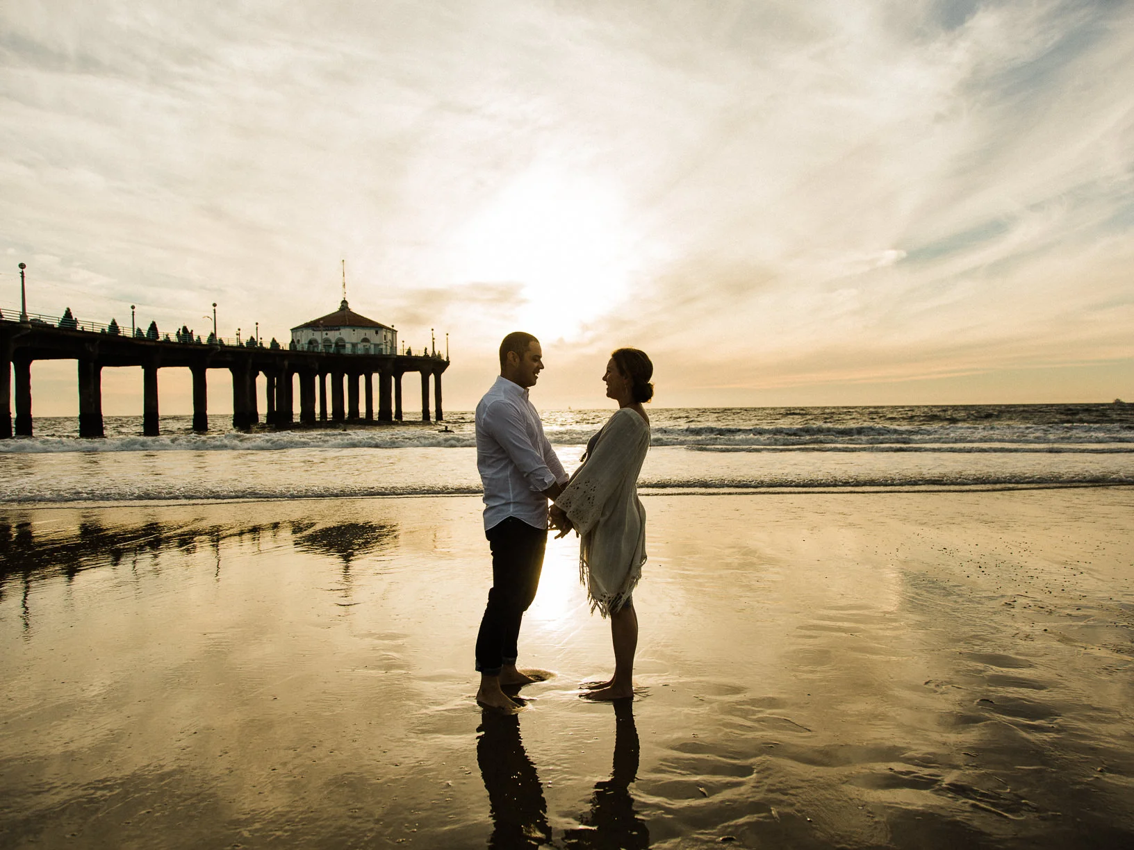 Juli and Tim Maternity Portrait Session at The Manhattan Beach Pier in Manhattan Beach, CA from Daniel Doty Photography. Maternity Portrait Session at The Manhattan Beach Pier Photographs and Maternity Portrait Session at The Manhattan Beach Pier Photography from Fine Art Family Portrait and Wedding Photographer, engagement photographer and Wedding Photographer Daniel Doty Photography.