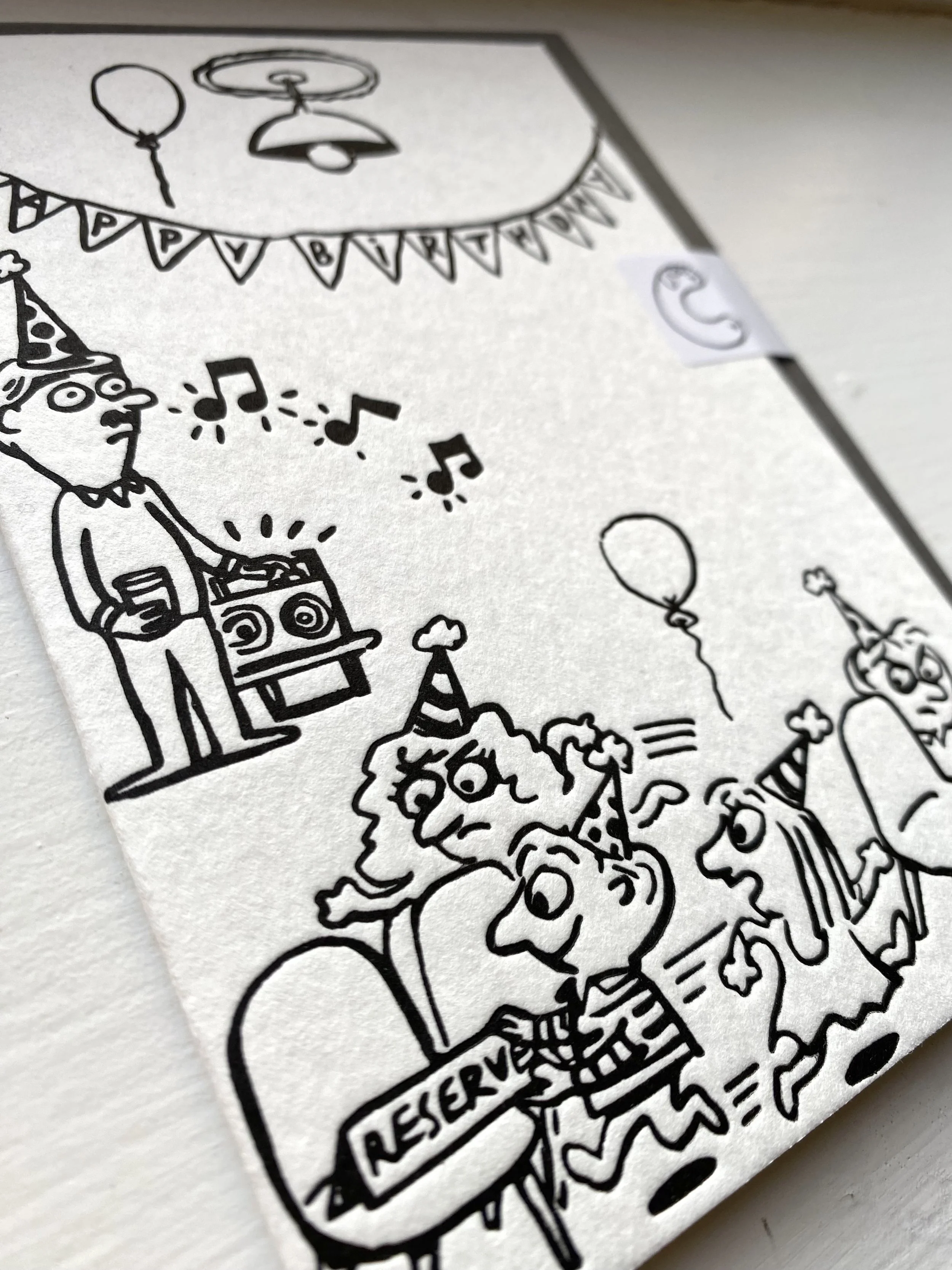 Musical chairs letterpress cartoon birthday card