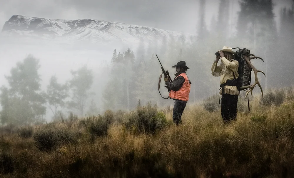 2 Hunters glassing on hillside.jpg