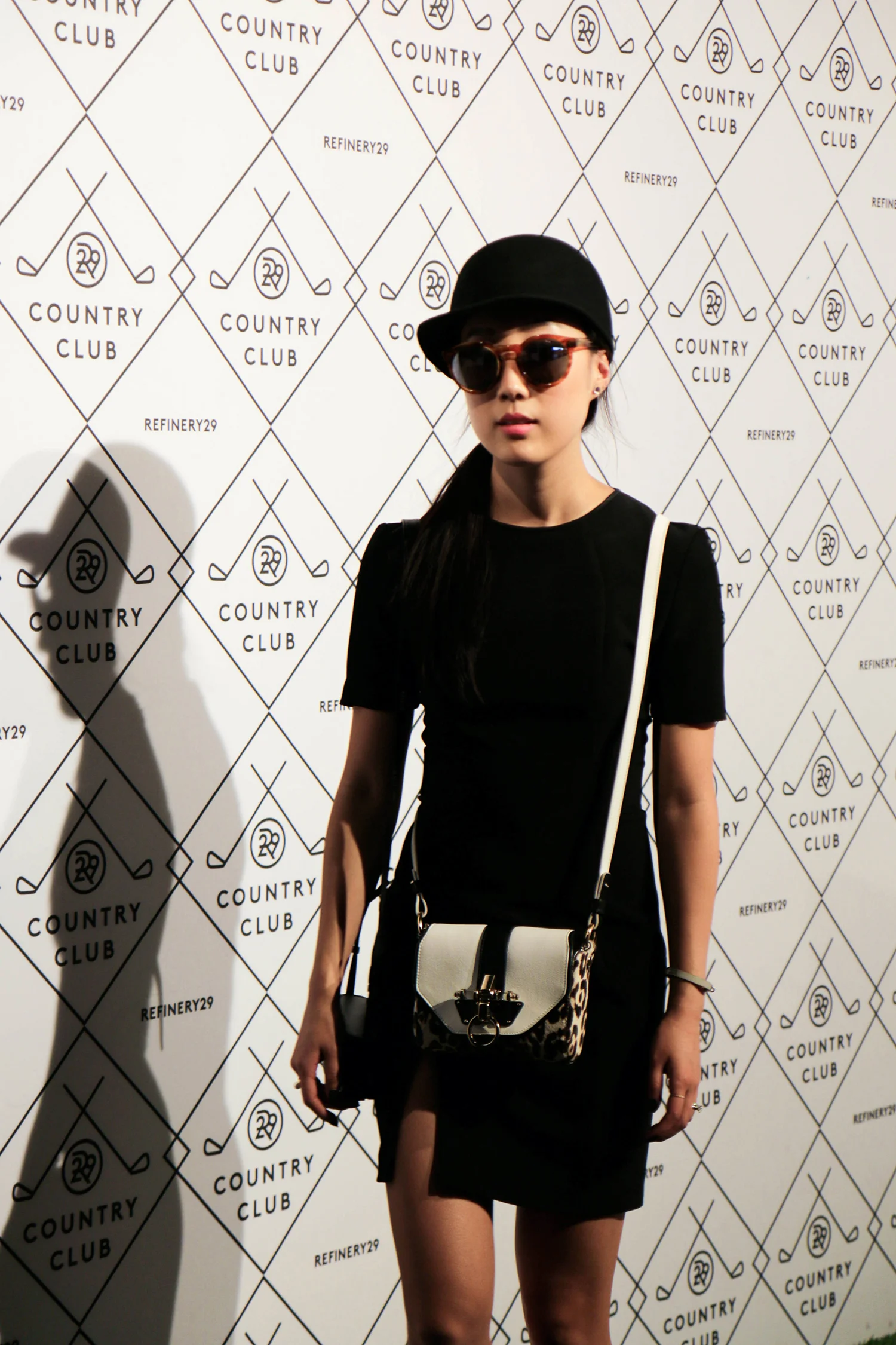 T by Alexander Wang Dress ( Similar , Similar ), Givenchy Bag ( Similar ), Illesteva Sunglasses , Vintage Hat, Hermes Bracelet ( Black , White ), Cooee Earrings