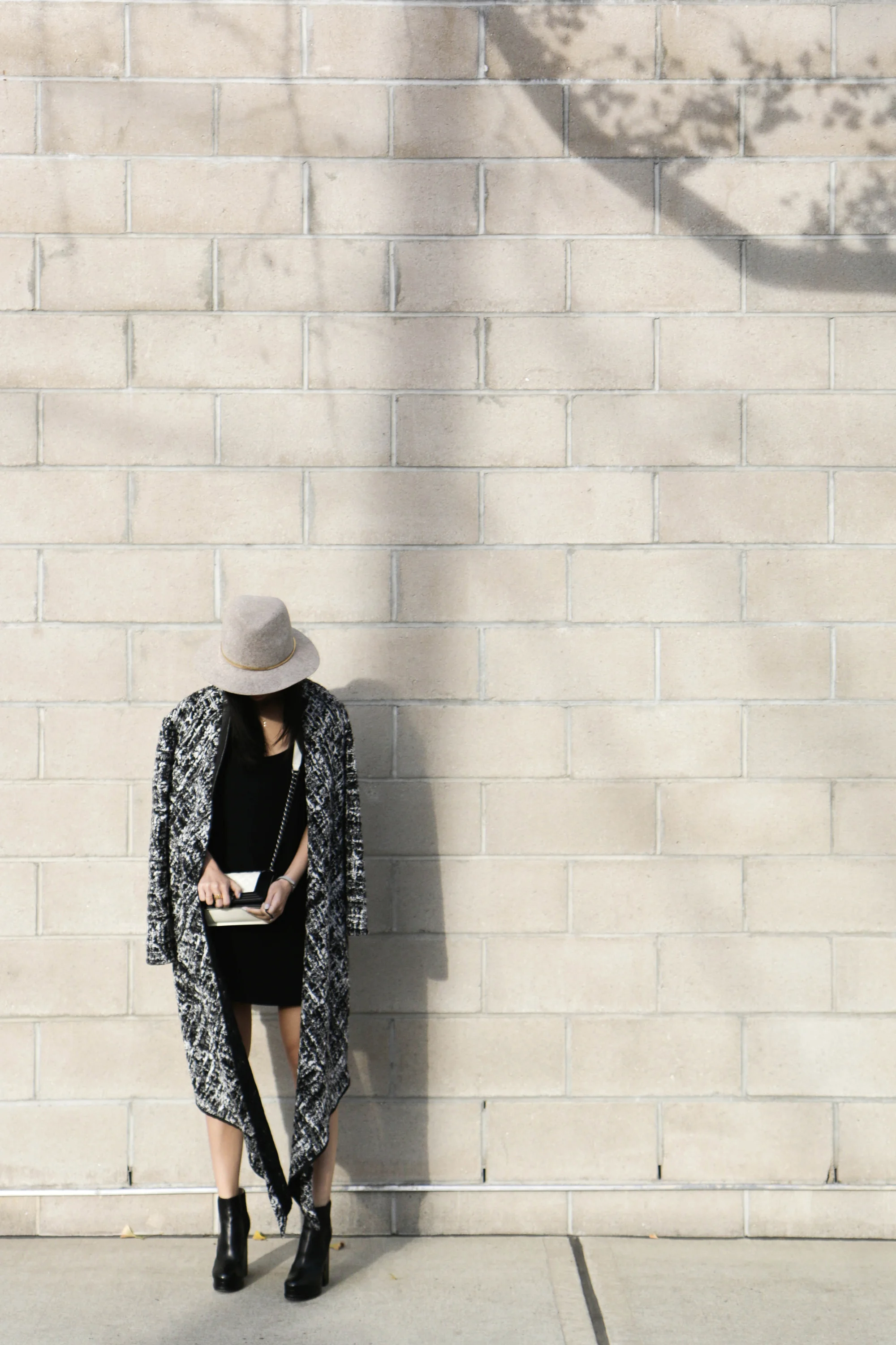 Marie Hell Submit Tunic Dress, Valdis Coat, Chanel Shoes and Bag, The Row Sunglasses, Janessa Leone Hat