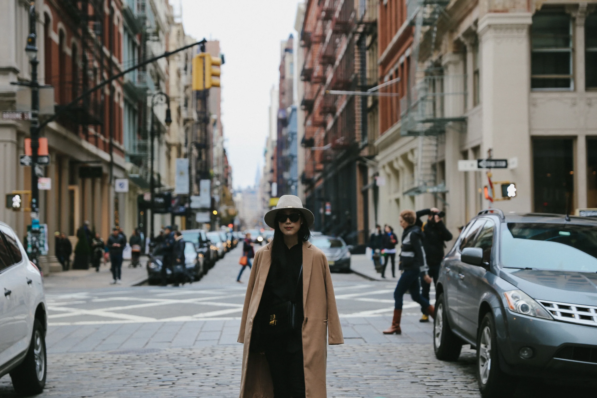 Kimchi Blue Coat , BDG Shirt , BDG Jeans , Balenciaga Shoes, Janessa Leone Hat , Céline Bag, Hermes Watch, Saint Laurent Ring