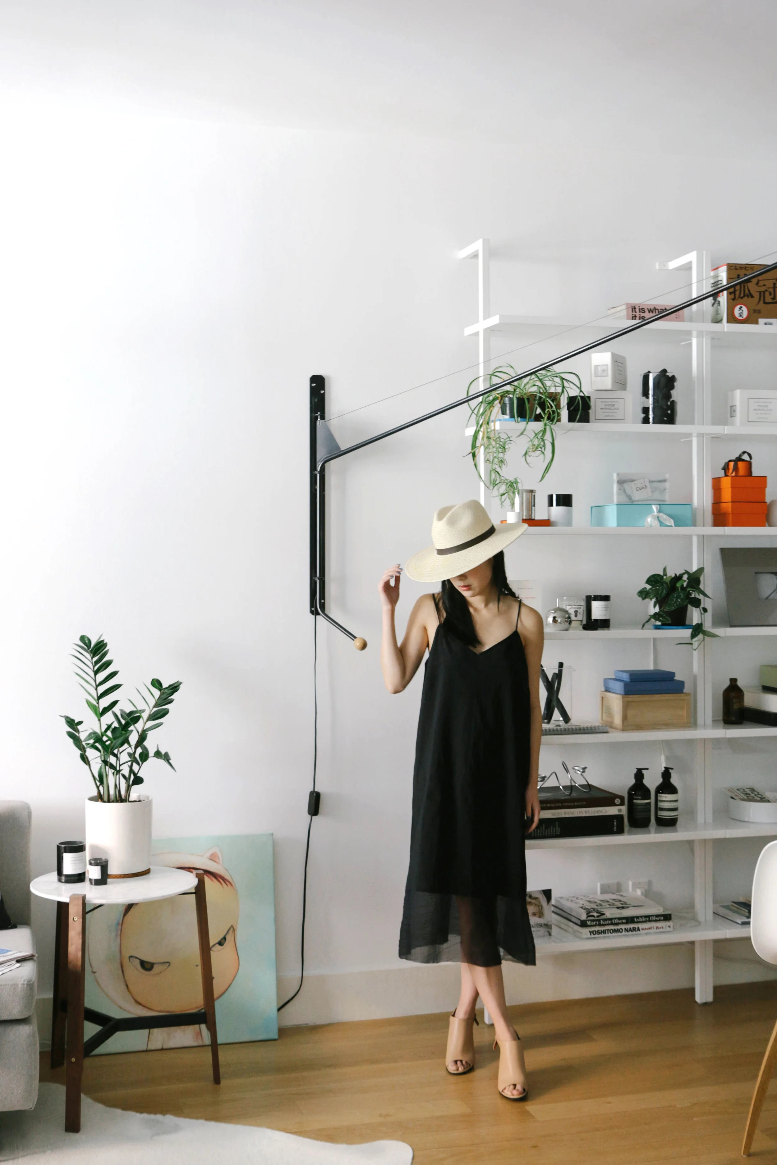 Pas de Calais Dress, Givenchy Sandals ( Black , White ), Janessa Leone Hat , Gjenmi Necklace A little peek at at my apartment, and a little peek at a very feminine look. The clean cuts near the neckline and the sheer details on the bottom gives it an alluring, yet very chic vibe.