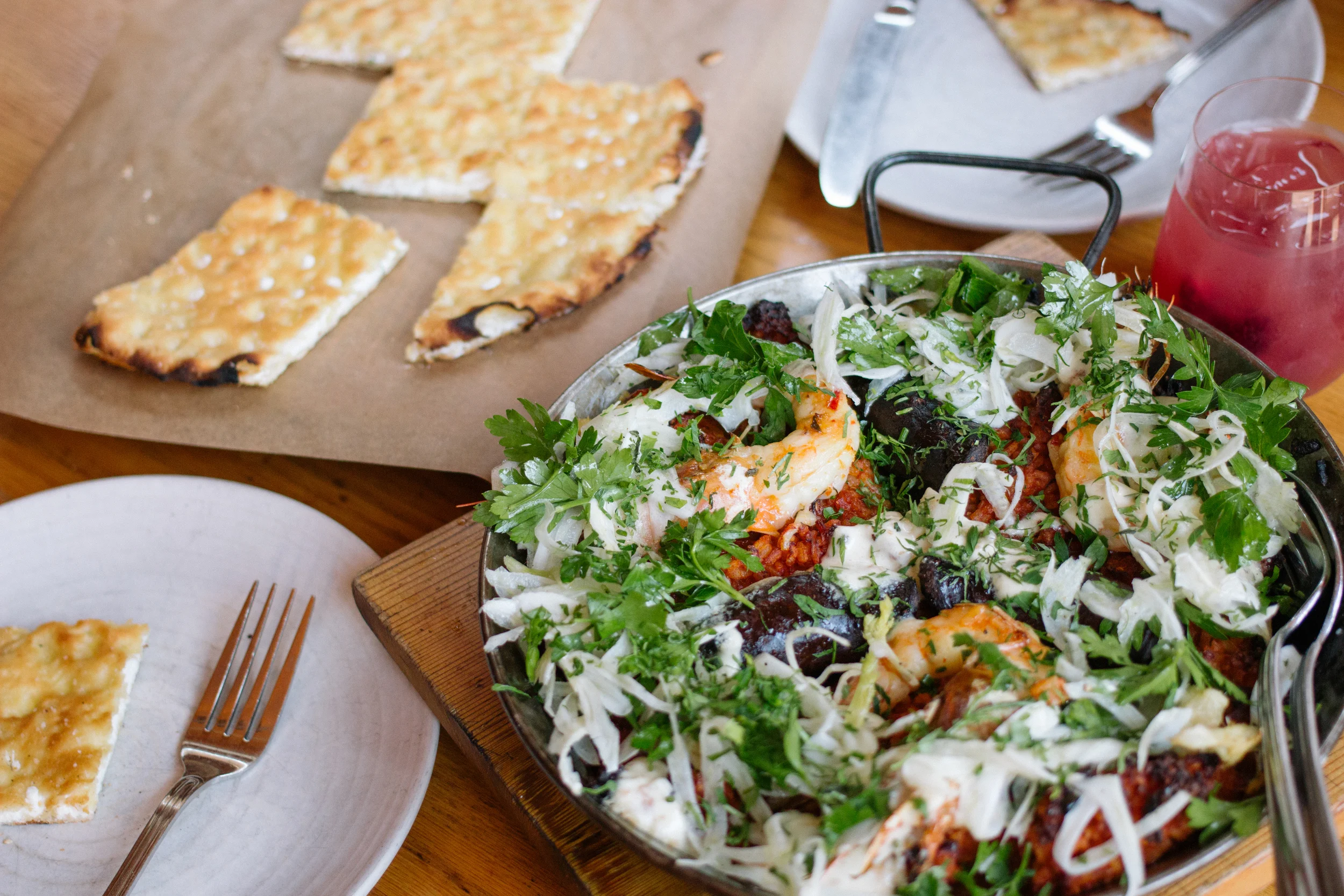 Dinner of truffle foccacia and seafood paella paired with sangria at avec
