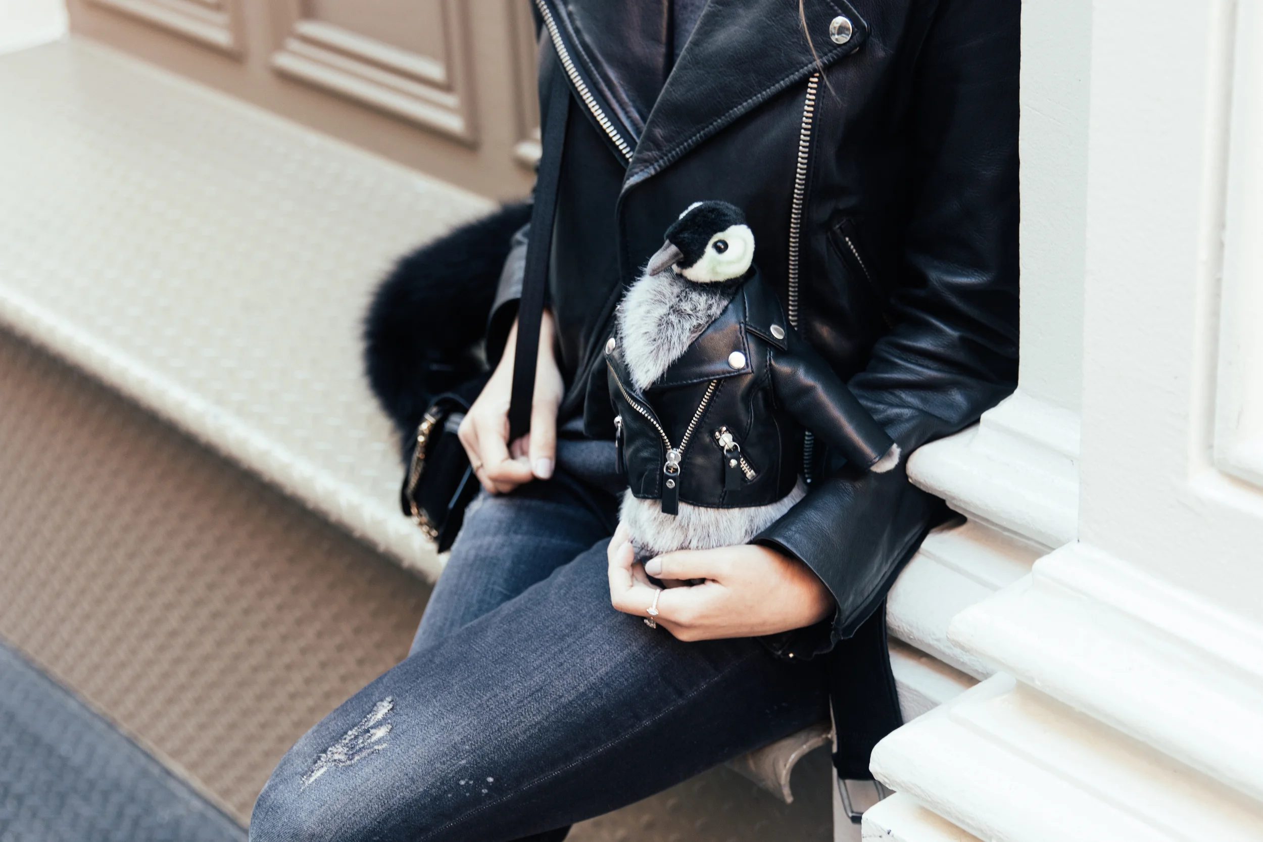 Leather jacket matching with Penny , Barneys New York Holiday Mascot