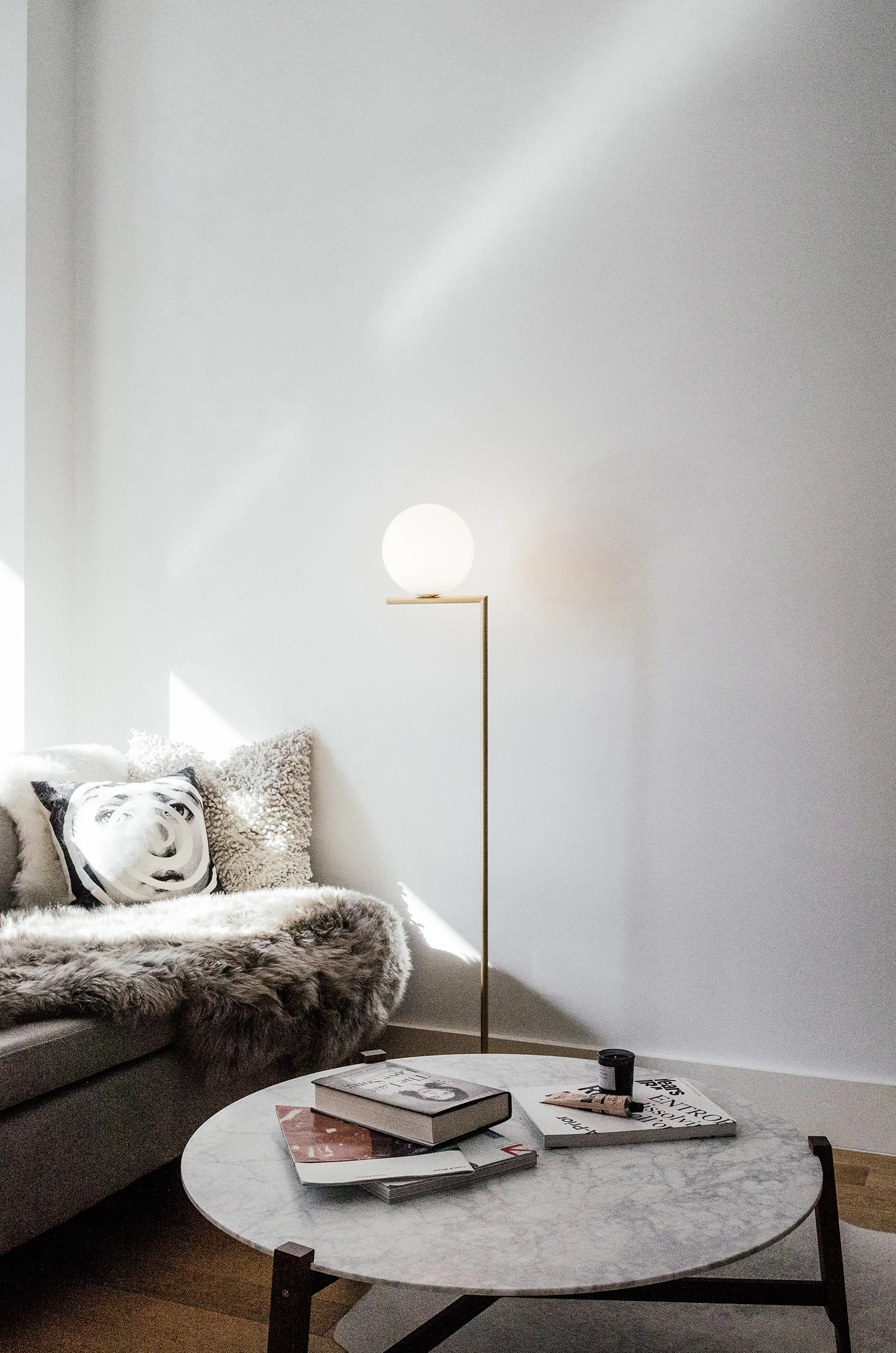 Sheepskin and FLOS Lamp from DwellStudio