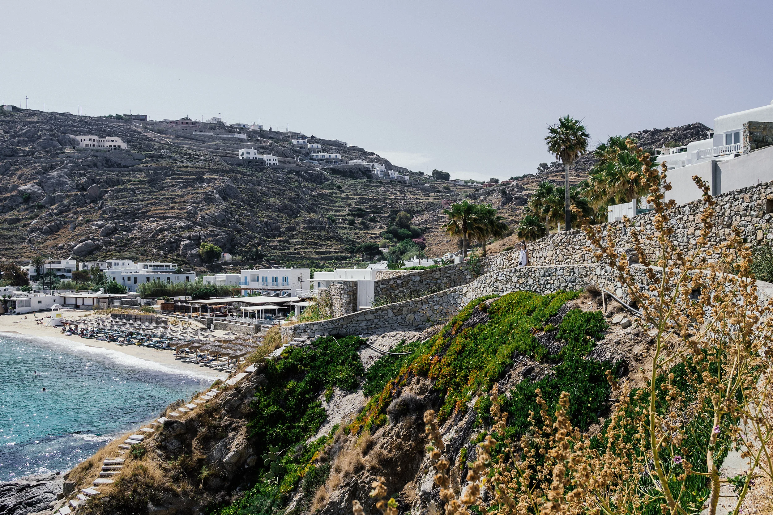 Taking the shortcut to Psarou Beach from our hotel
