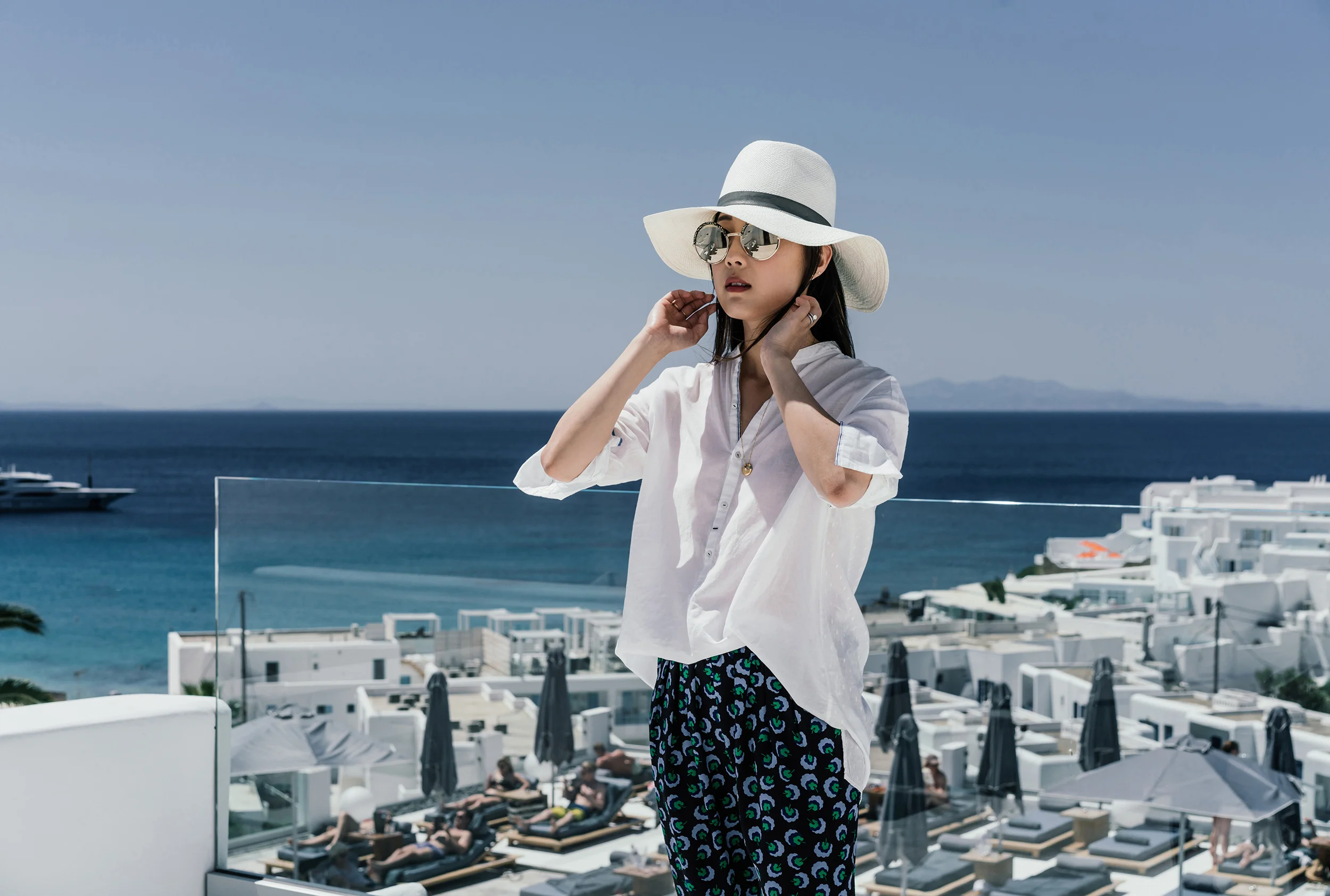 Pas de Calais Top , Stella McCartney Pants, Vince Shoes , Janessa Leone Hat , Cutler and Gross Sunglasses , Cartier Necklace