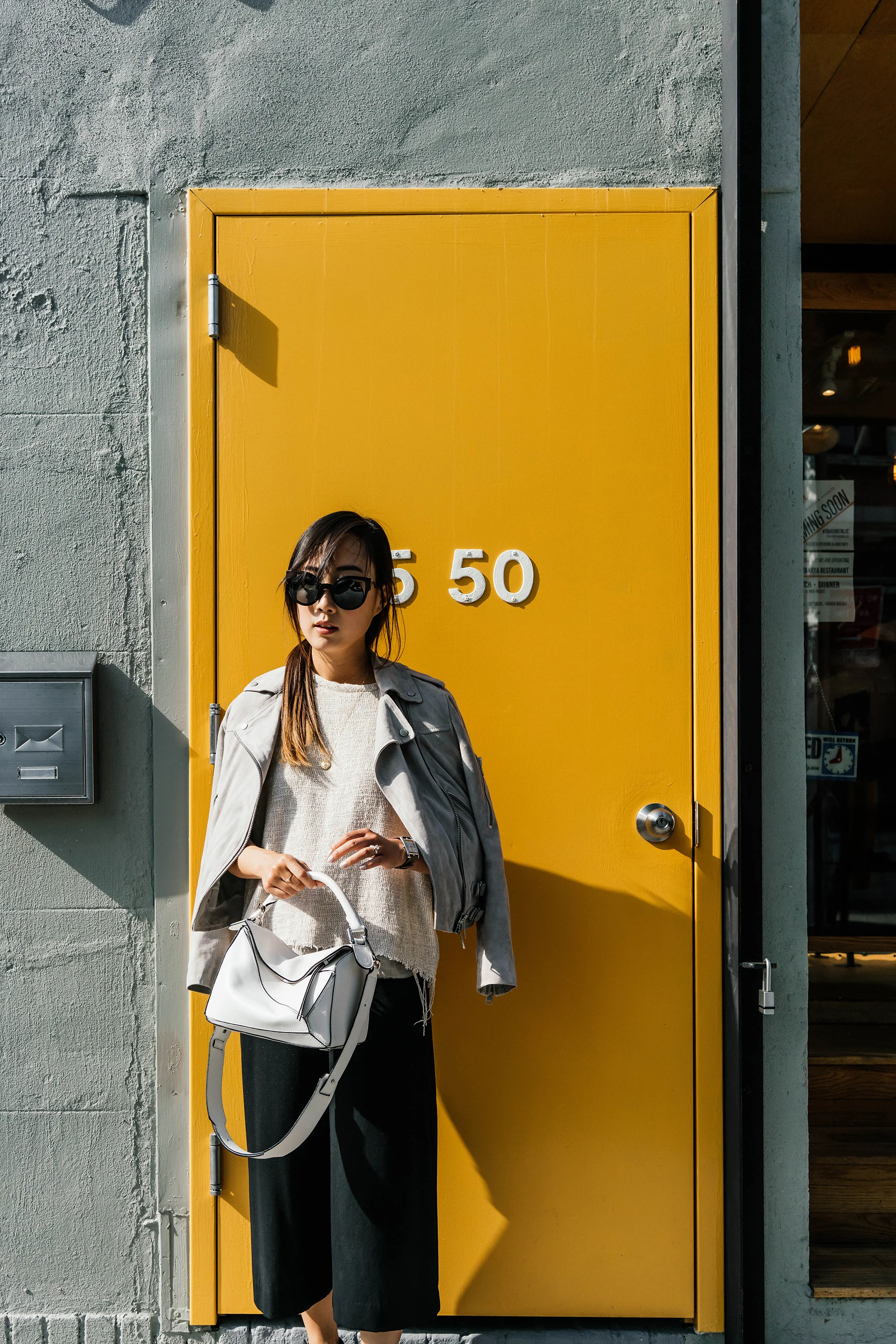 AllSaints Jacket , Simon Miller Top , COS Pants, Céline Shoes, Loewe Bag , Fendi Sunglasses