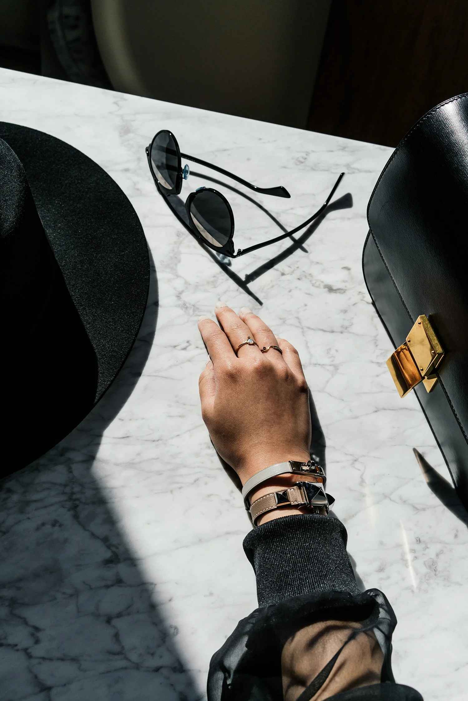 Janessa Leone Hat , Dior Sunglasses , Céline Bag, Hermes Bracelet and Watch, Wwake Rings