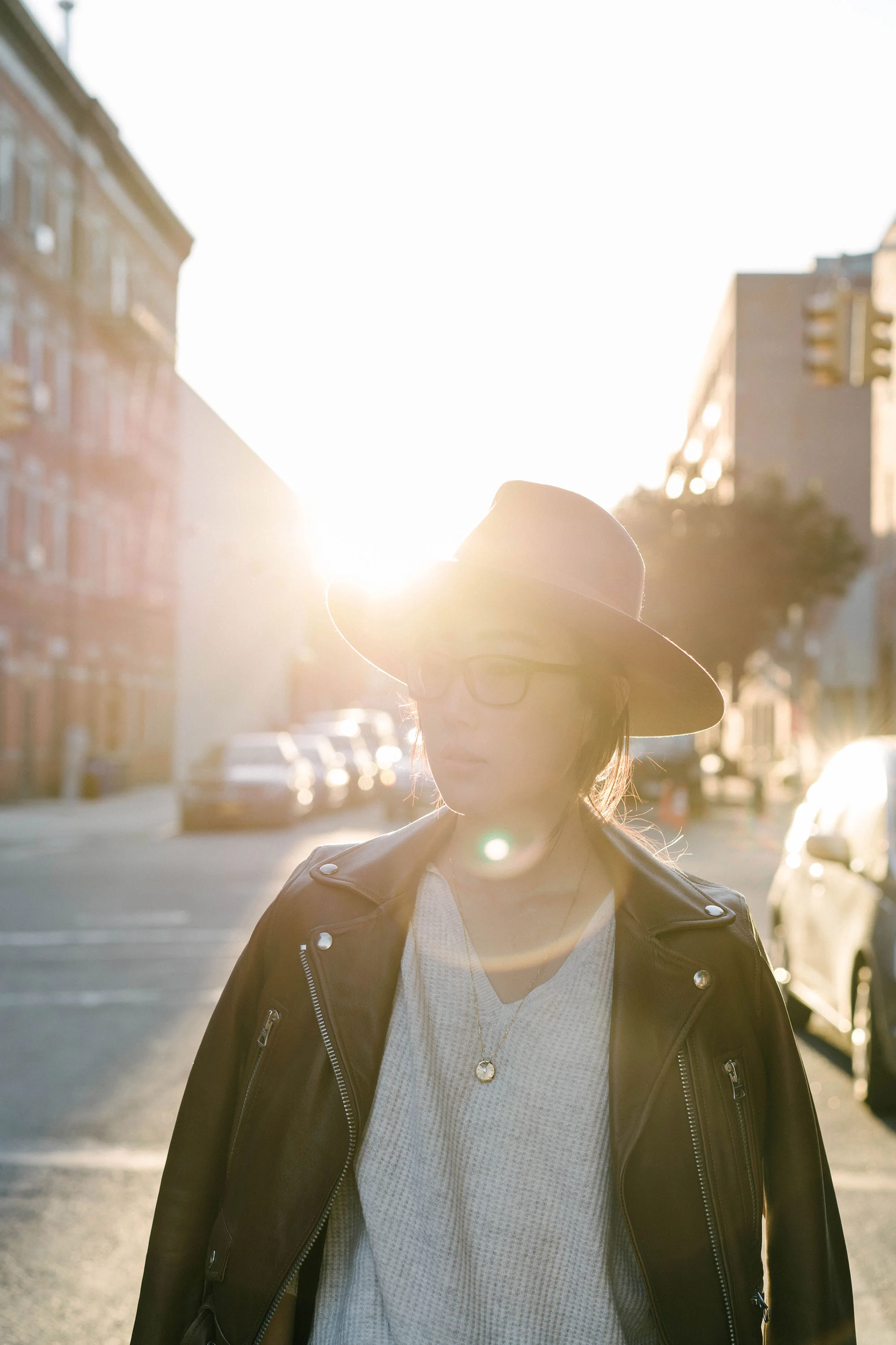 Acne Studios Jacket ( Black ), COS Sweater , Janessa Leone Hat , Cartier Necklace , Celine Glasses
