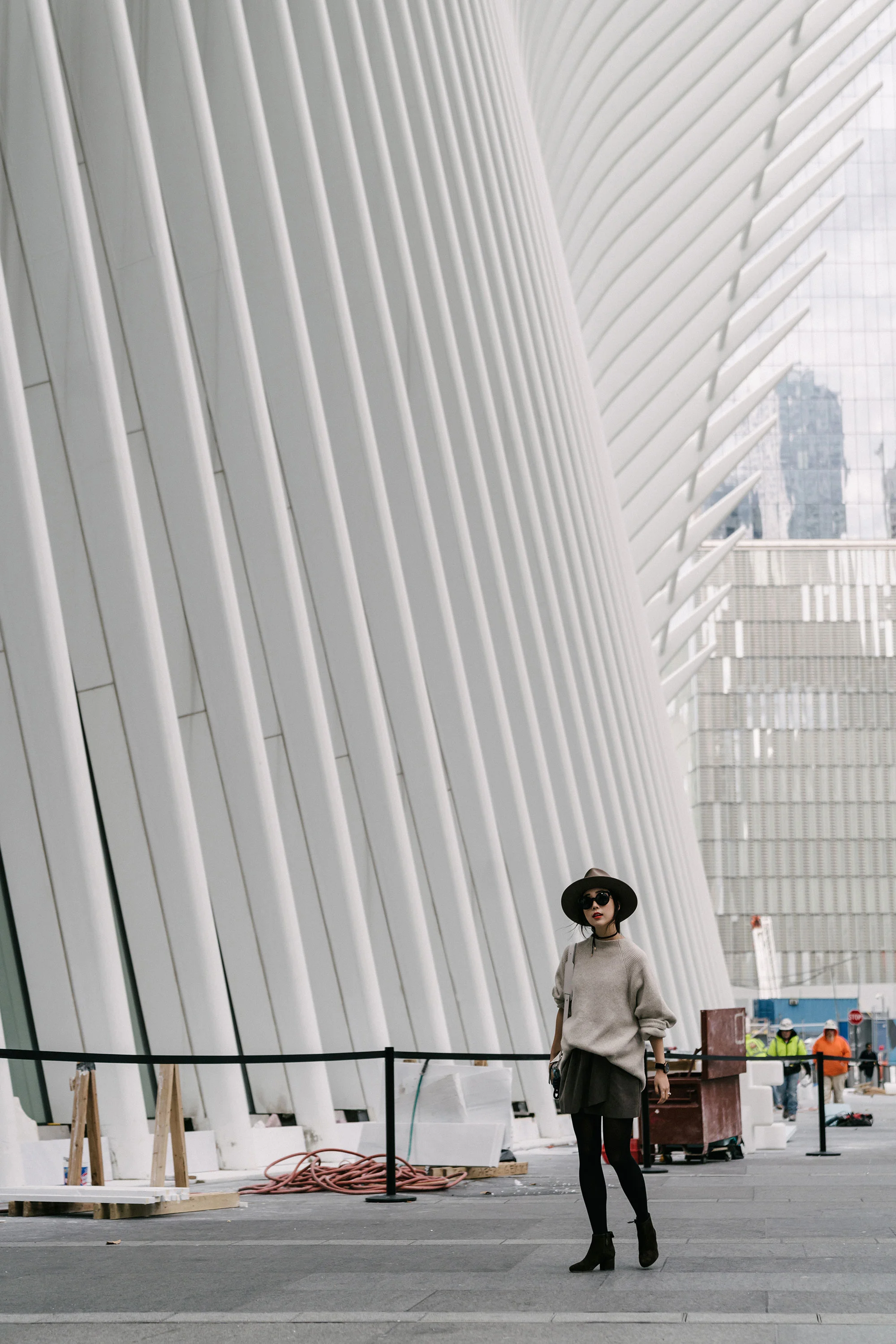 Movado Watch , The Row Sweater, Aritzia Skirt , Yvonne Koné Boots , Loewe Bag , Janessa Leone Hat , Fendi Sunglasses , Kat Kim New York Rings