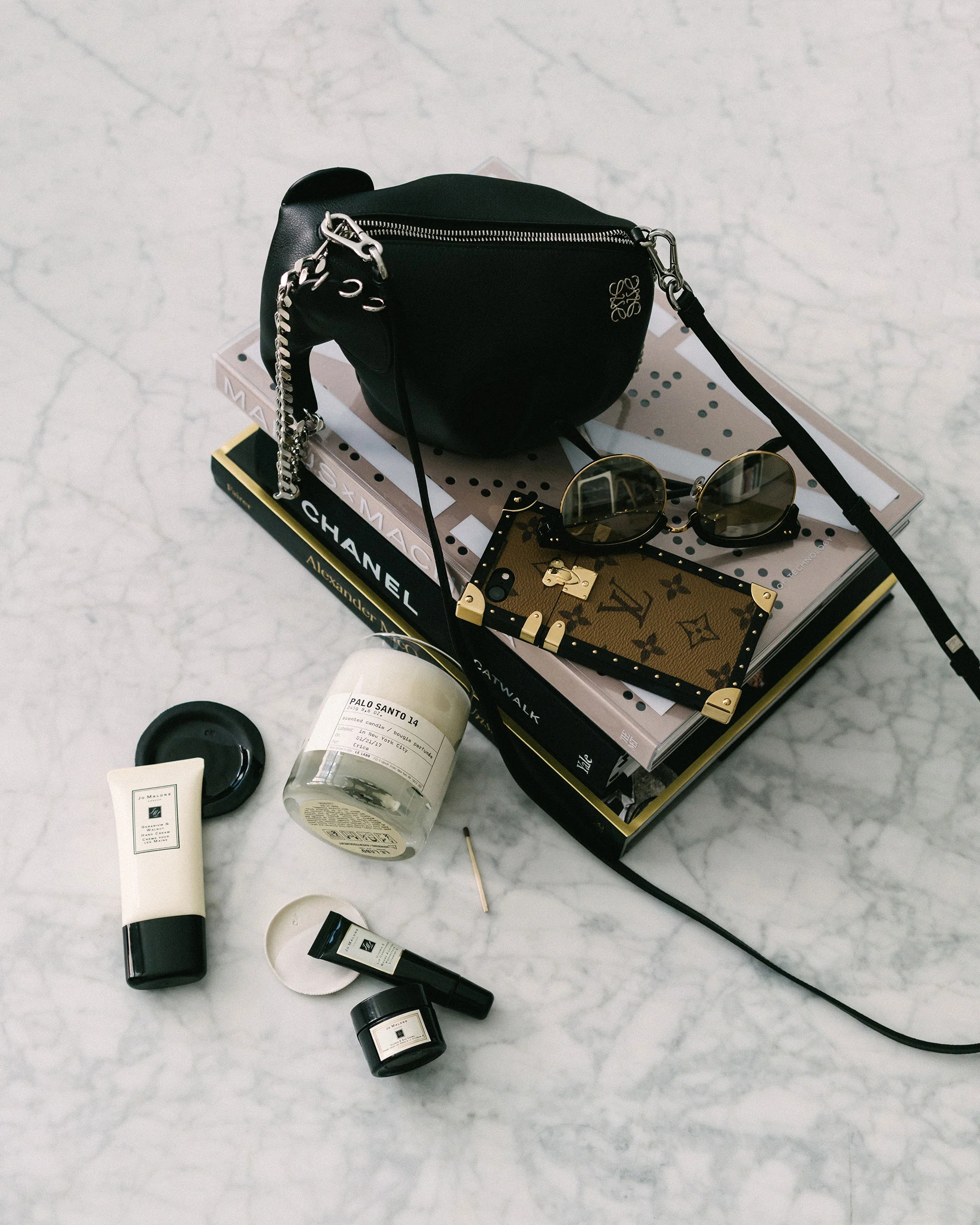 Loewe Bag , Louis Vuitton iPhone Case, Le Labo Candle , Jo Malone Hand Cream , Eye Cream , Lip Balm