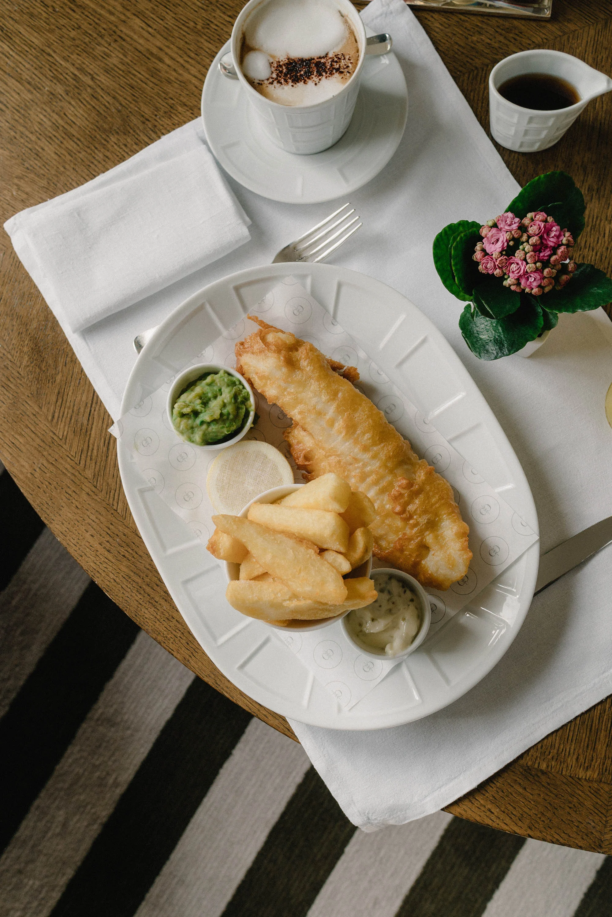 In-room lunch of fish & chips and cappuccino