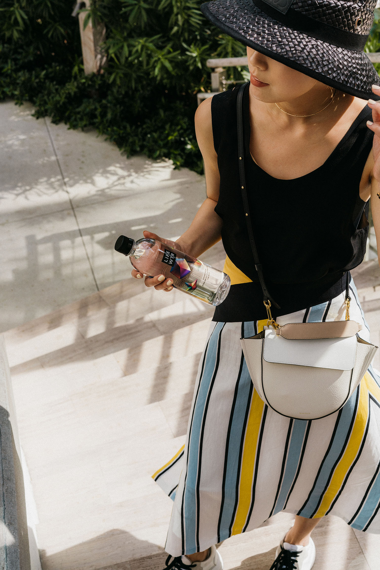 Chloe Top, LIE Collection Skirt, Celine Shoes, Loewe Hat, WWAKE necklace , LIFEWTR
