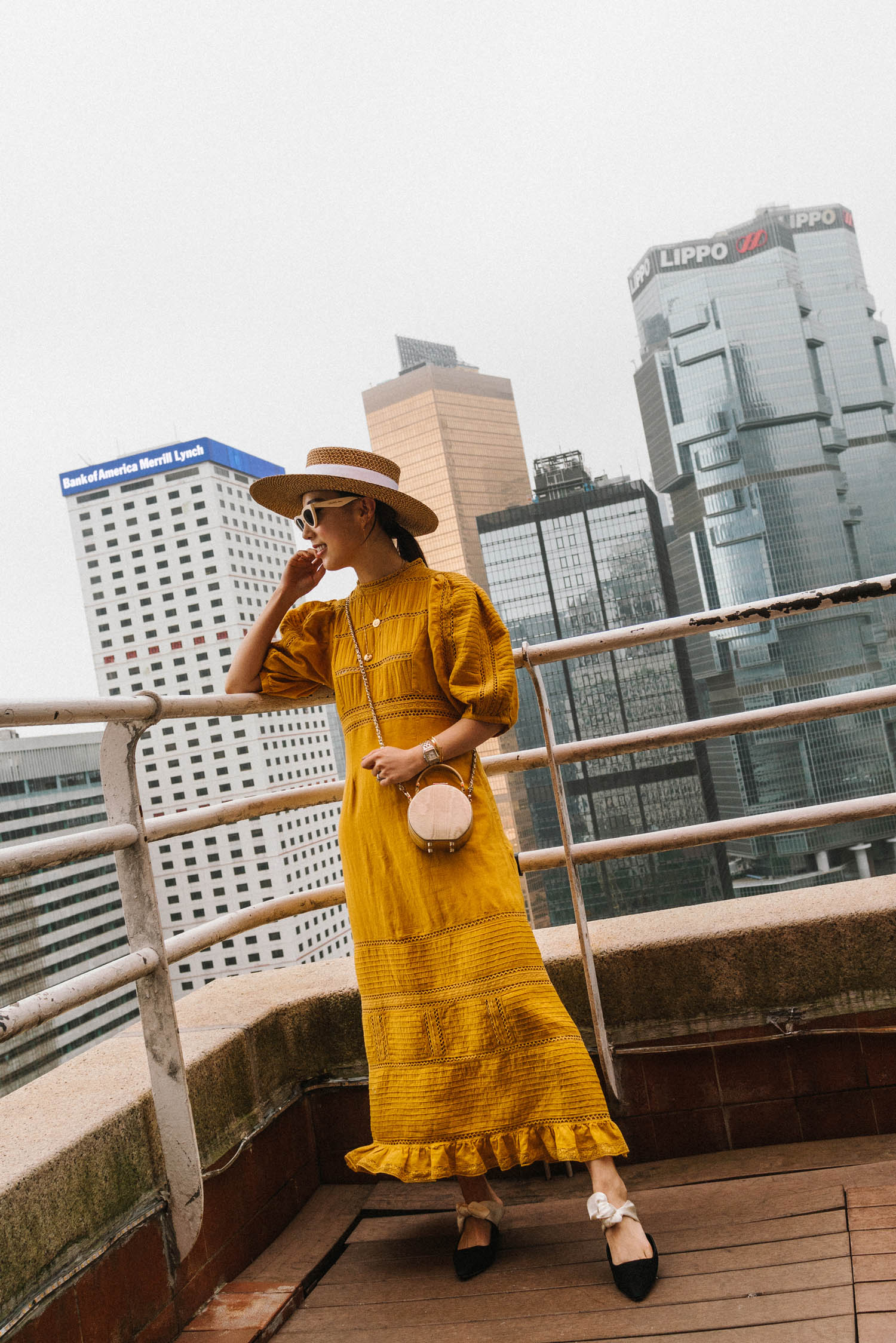 Sea New York Dress, The Row Shoes, Aspinal of London Bag, Eric Javits Hat, Celine Sunglasses