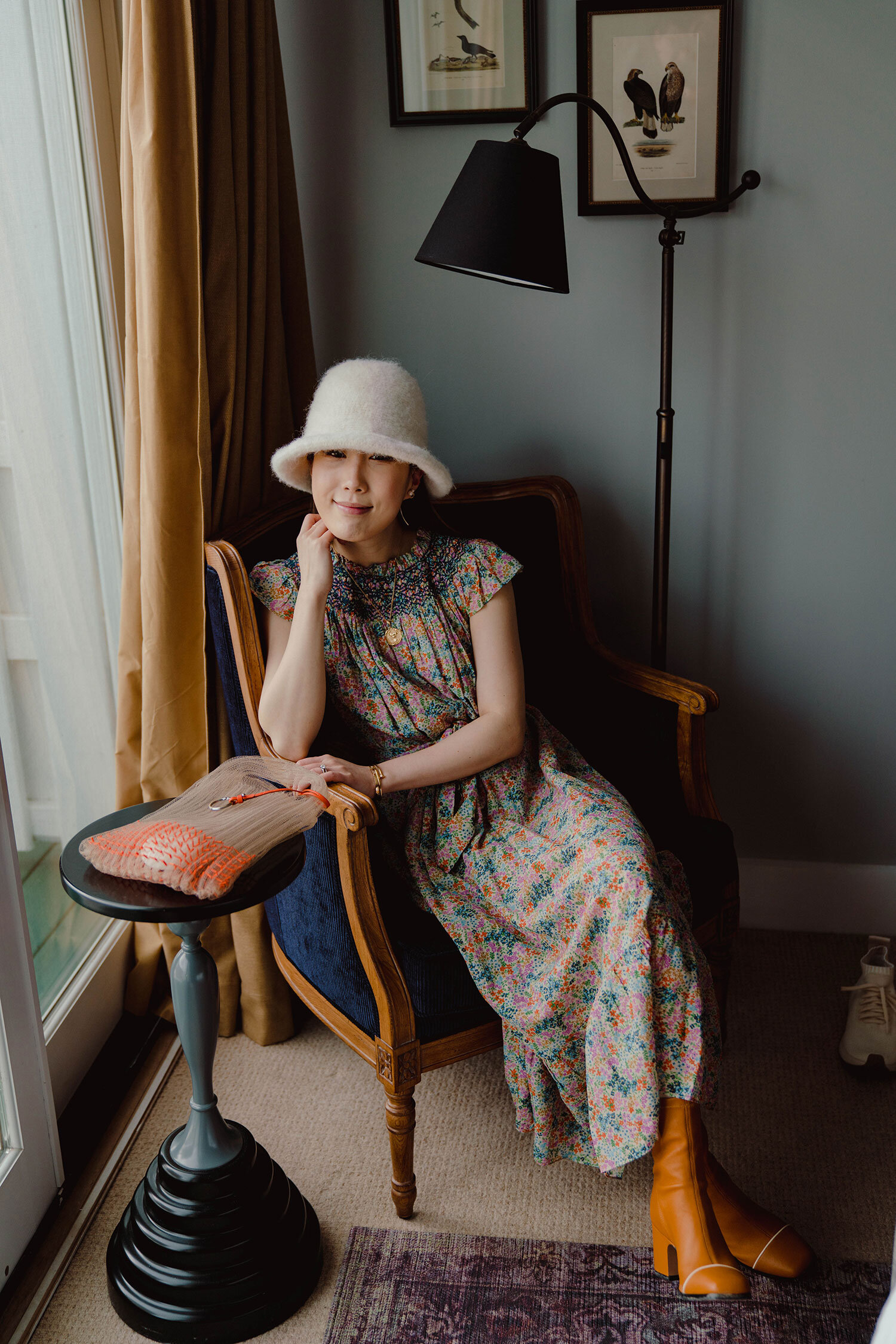 Above: Doen Dress, Nomasei Boots, Jil Sander Bag, Lauren Manoogian HatRight: Superegg Pouch, Superegg Moisturizer, Maison Michel Hat, The Nue Co Probiotics, Garrett Leight Frames