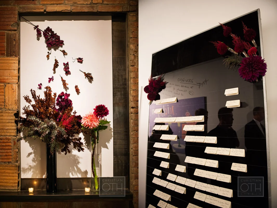 Whimsical floral design during cocktail hour. Table cards hang from invisible wire tied to a tall black lucite board. Photo: Sue Kessler of Christian Oth Studio