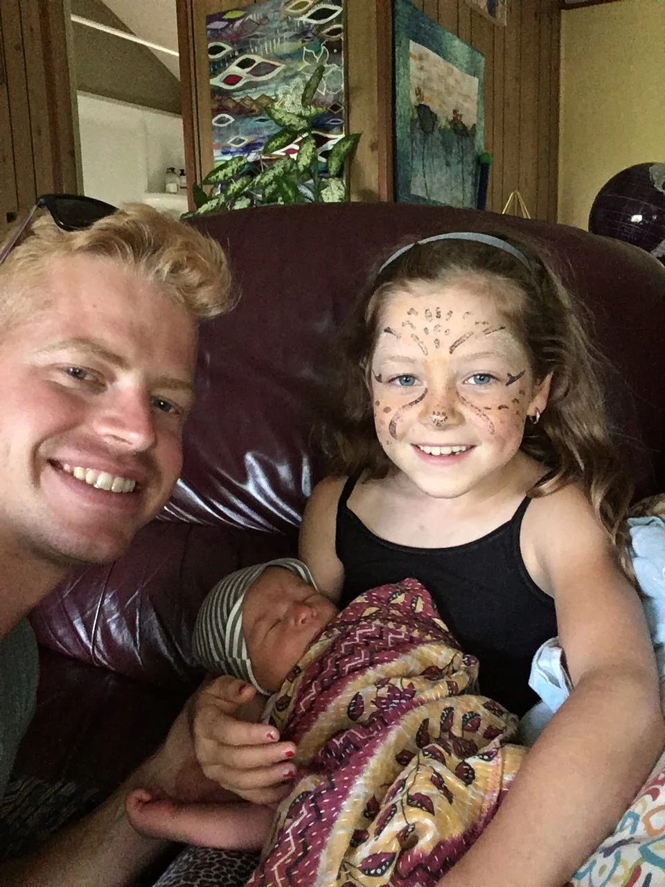  First cuddles with the cheetah cousin Jane! Future babysitter is all ready to hang out with Enoch. 
