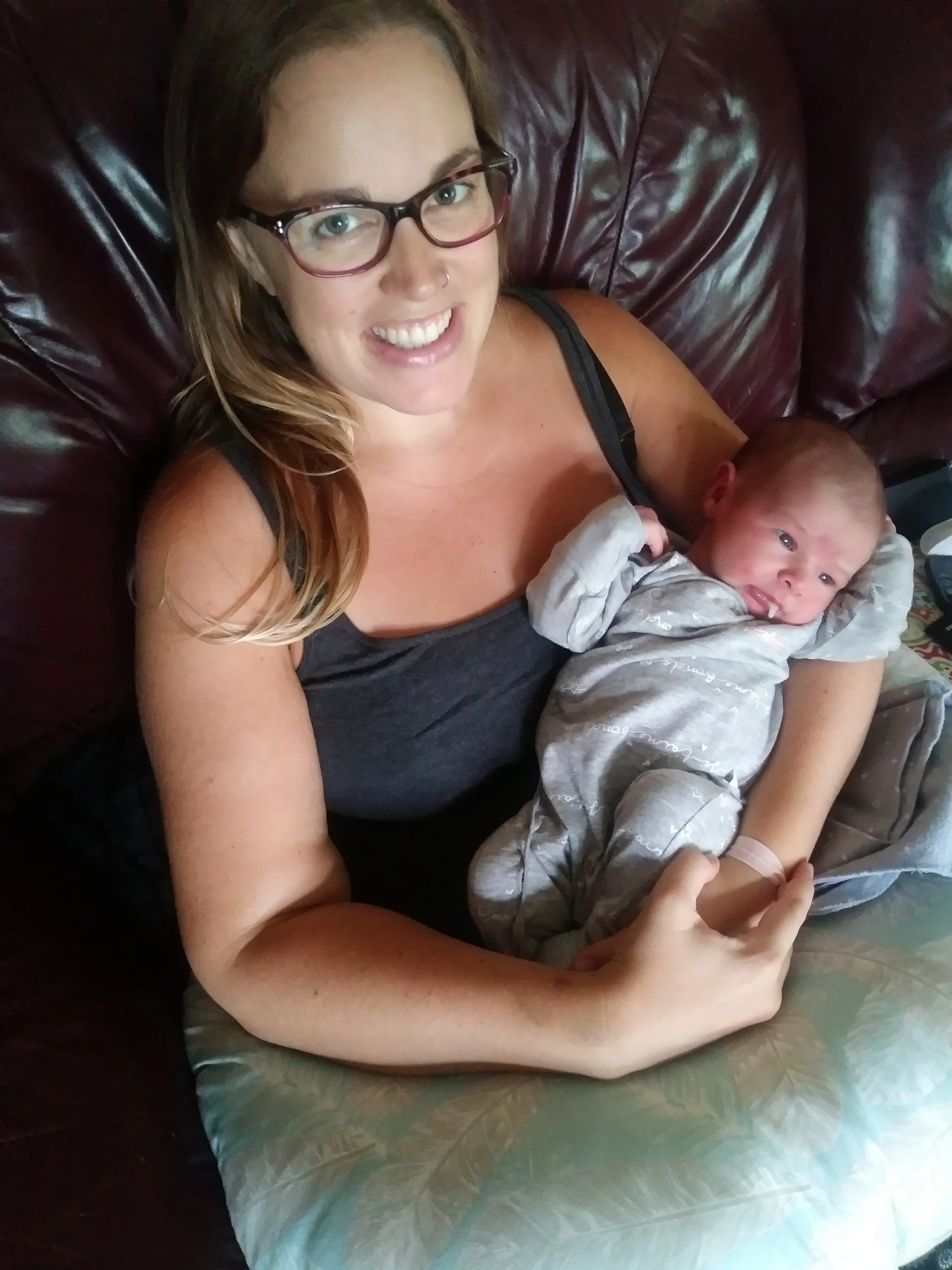  Dad’s favourite photo…Enoch barfing, but Mom looking nice! Haha 