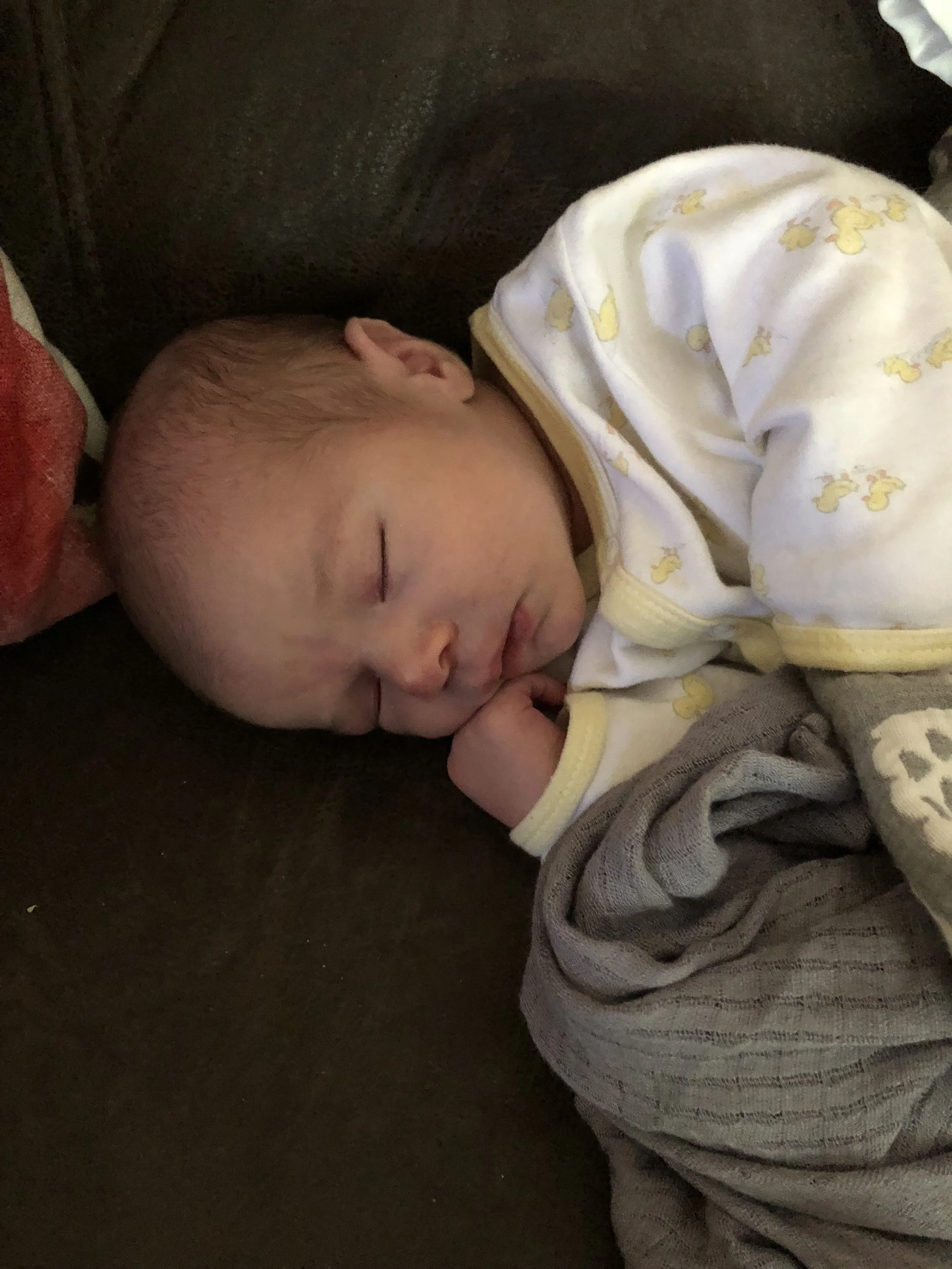  We learned that for the first couple weeks, Enoch napped the best on his side. 