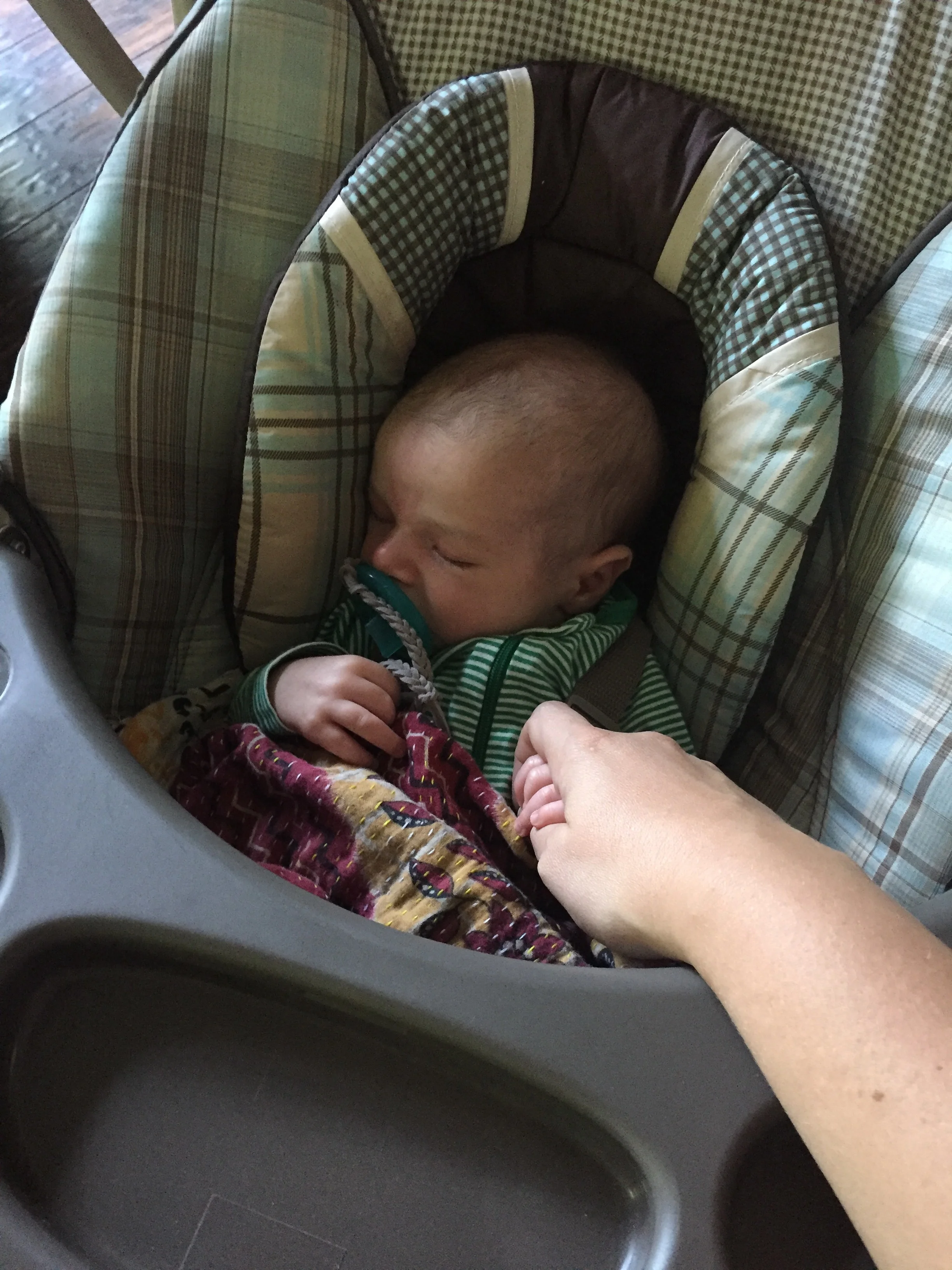  A very fussy day, and would only sleep when touching Mom. 