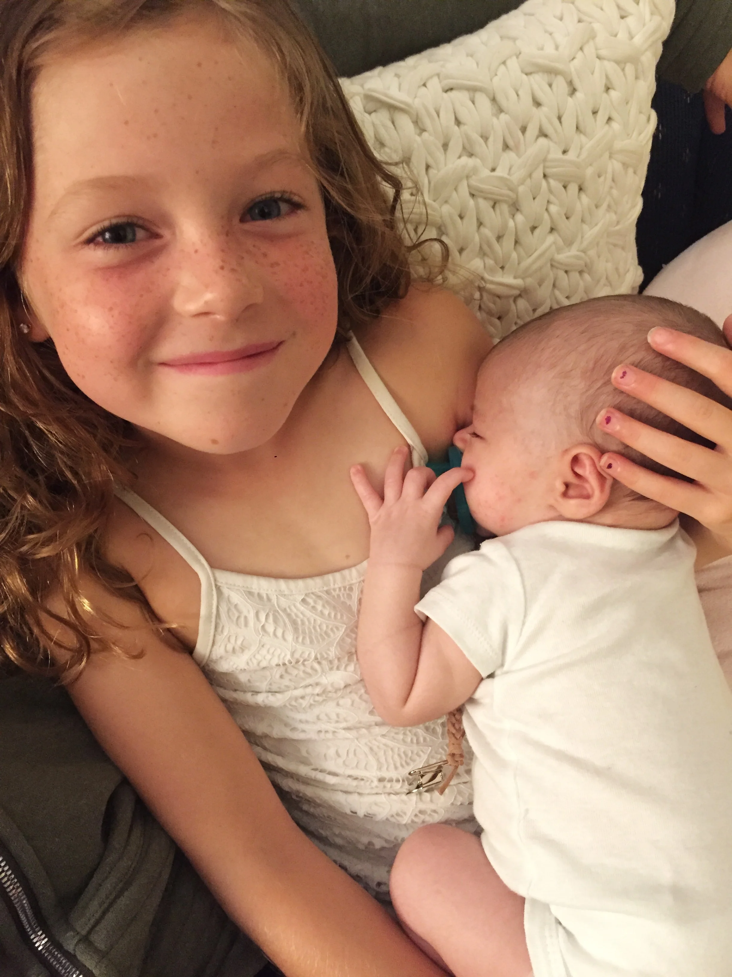  Afer a fussy day, Jane successfully rocked Enoch to sleep! 