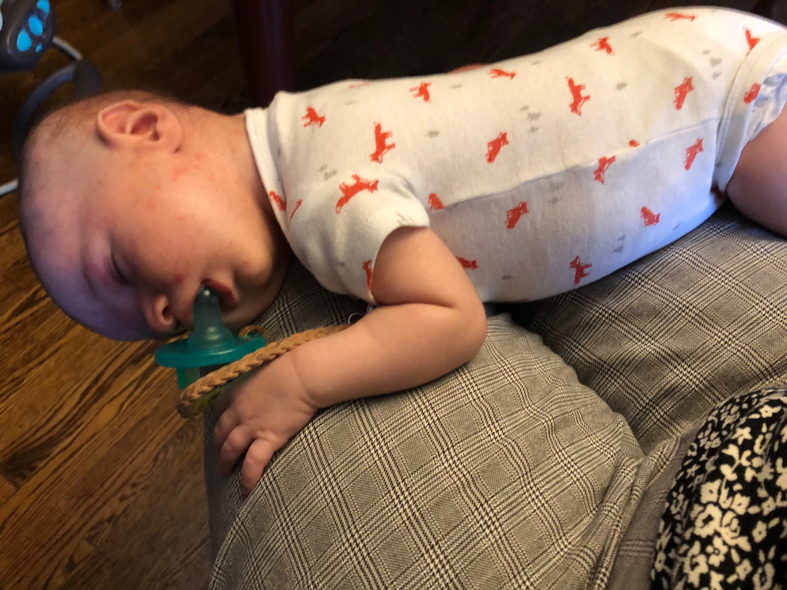  When he has a gassy tummy, Enoch’s favourite spot in the world is Grandee’s lap. He settles easily and quickly there, and will then sleep  there as long as Grandee can stand it. 