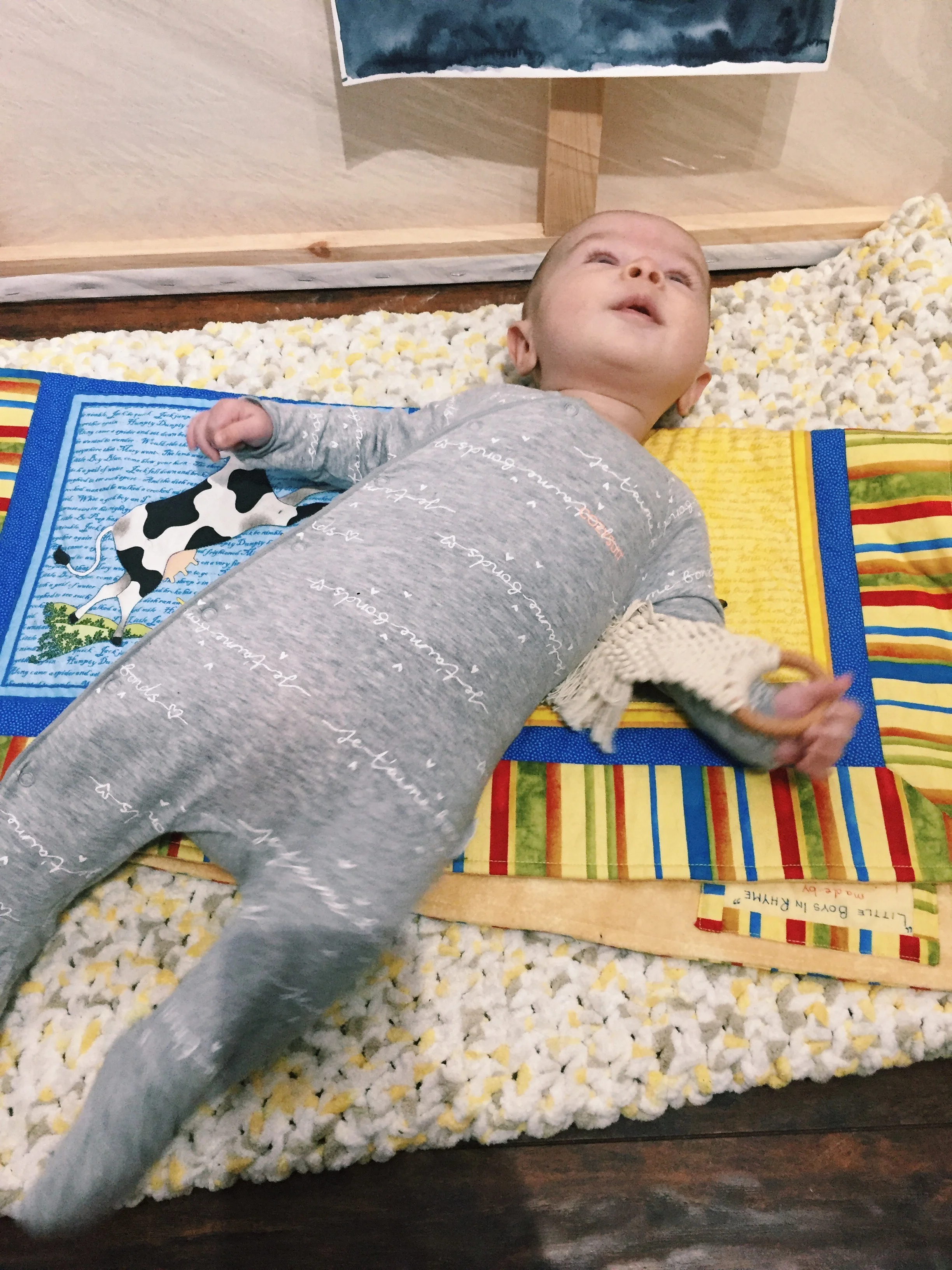  learning to turn…mom laid me parallel to the quilt! 