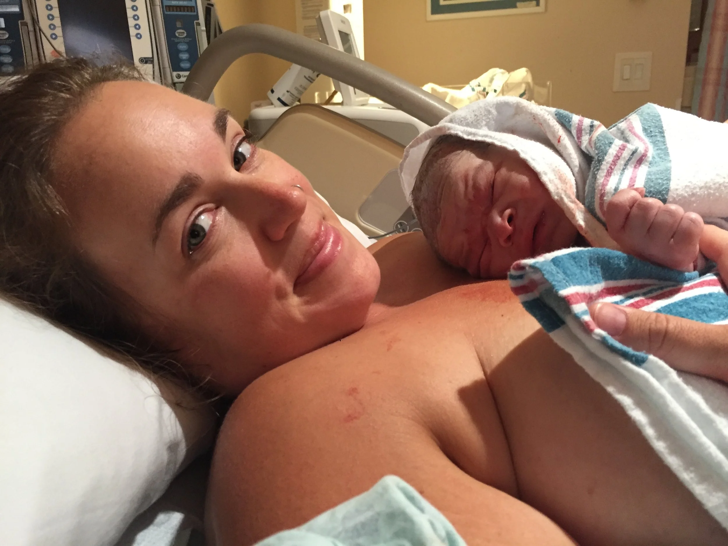  12 hours of sharp labour pains while Enoch tried to engage his head.  21 hours of active labour at home, before giving in and heading to the hospital for an epidural, since I was still only 5cm.  A wild and frantic delivery, with some unplanned occu