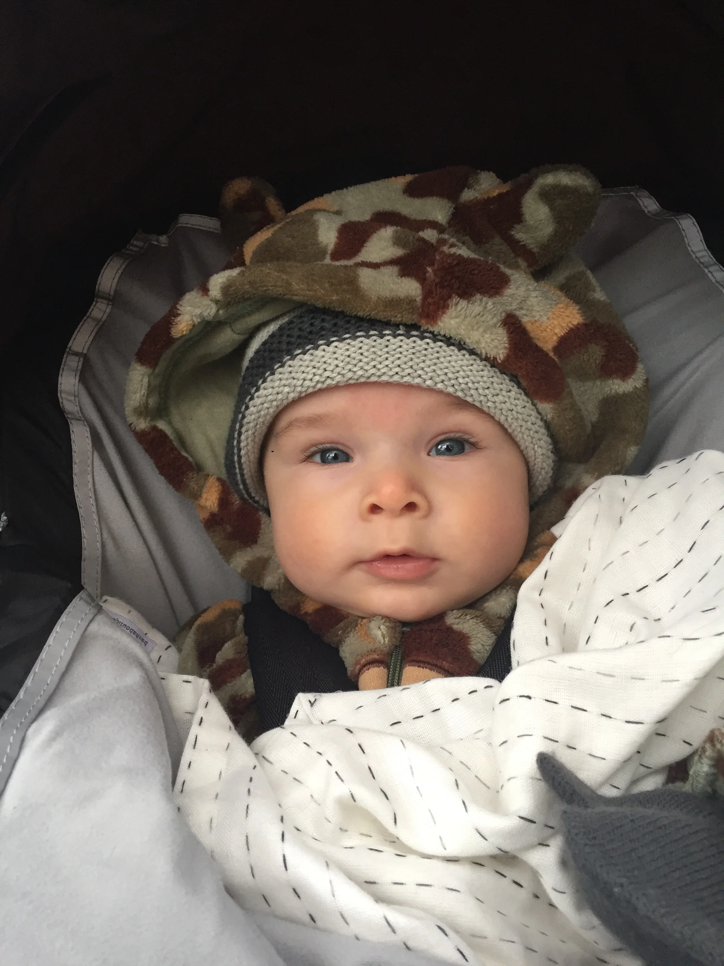  The rain stopped long enough for us all to go on a walk. Enoch loves looking at all the trees…just like his dad. 