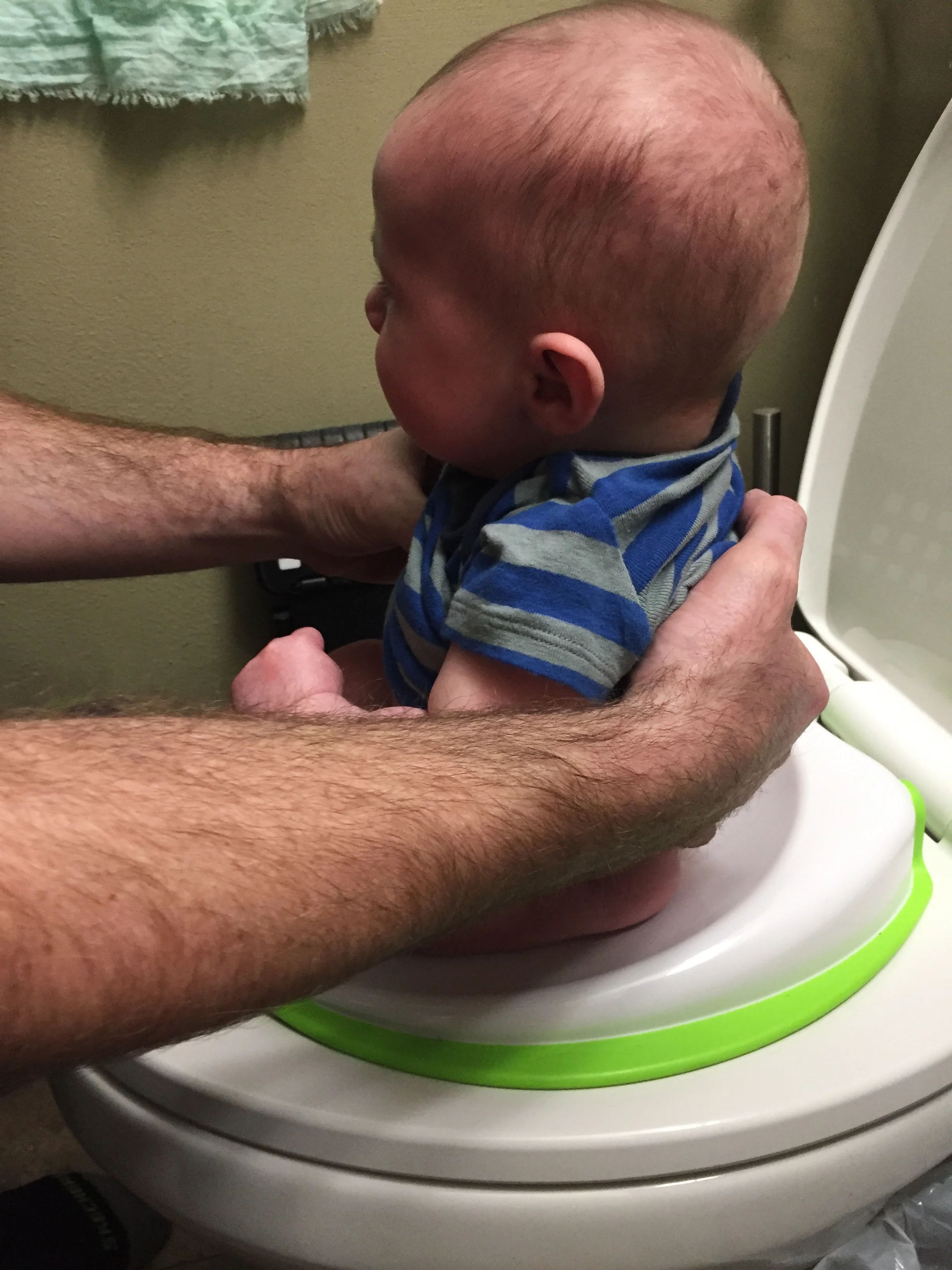  dad is determined to get potty training done early…this is also helping him with sore muscles from learning how to poop out more solids 
