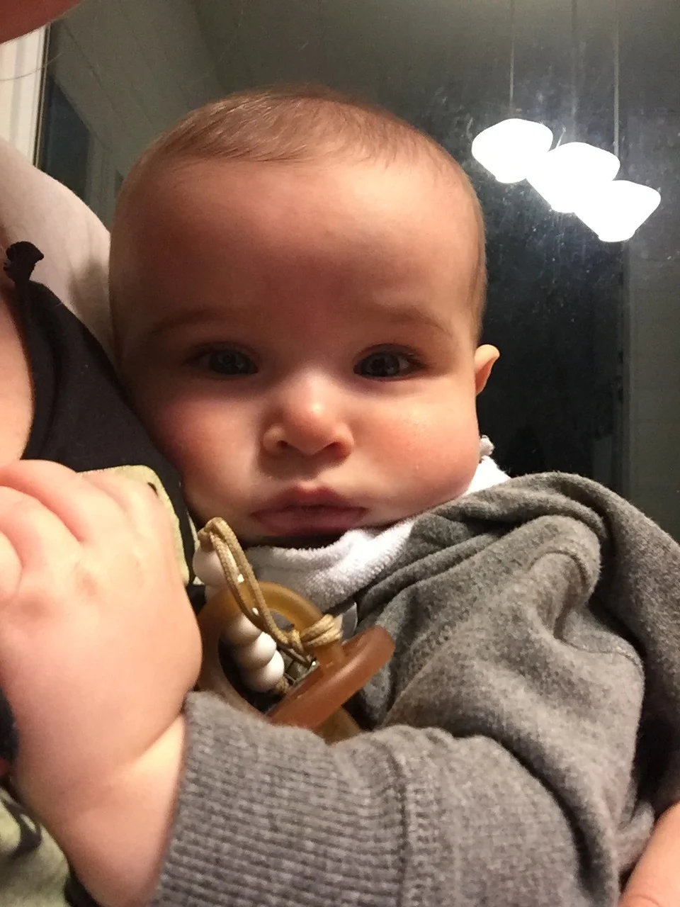  First illness (cold/cough) means lots and lots of cuddles with mom 