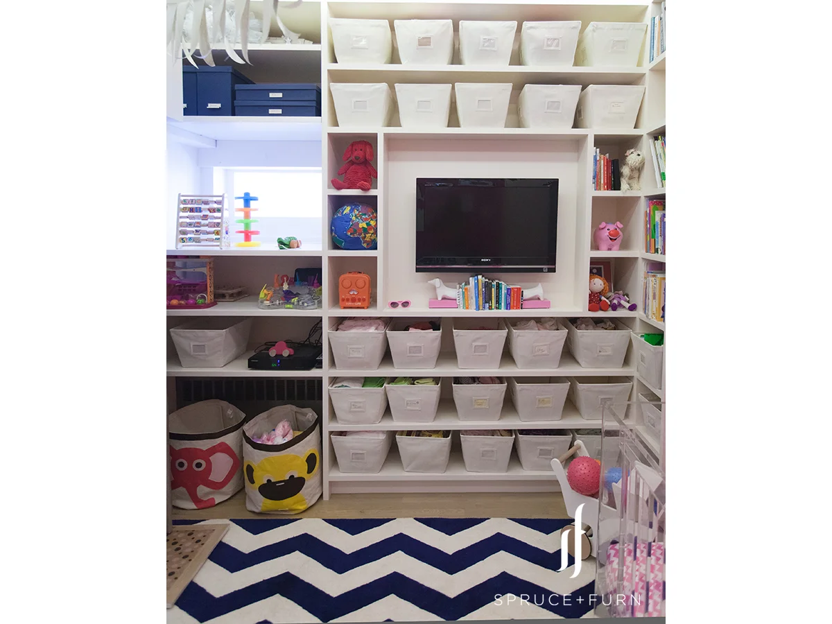 Tribeca Loft Nursery - Storage | Design by: Spruce + Furn | Photo: Steph Goralnick